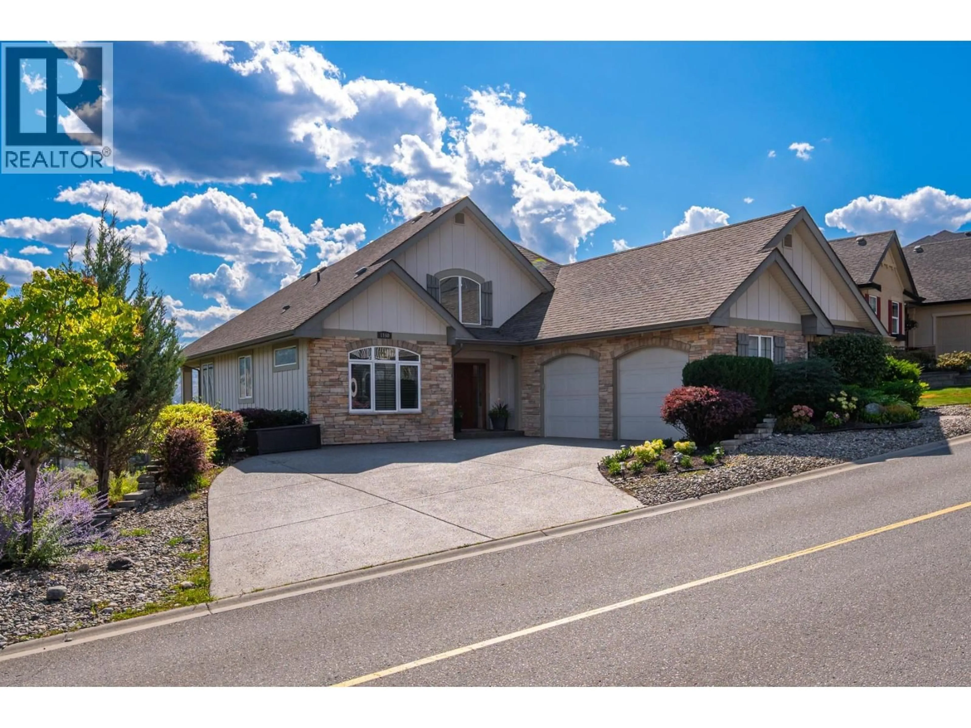 Home with vinyl exterior material, street for 1160 CANYON RIDGE DRIVE, Kamloops British Columbia V2H0A1
