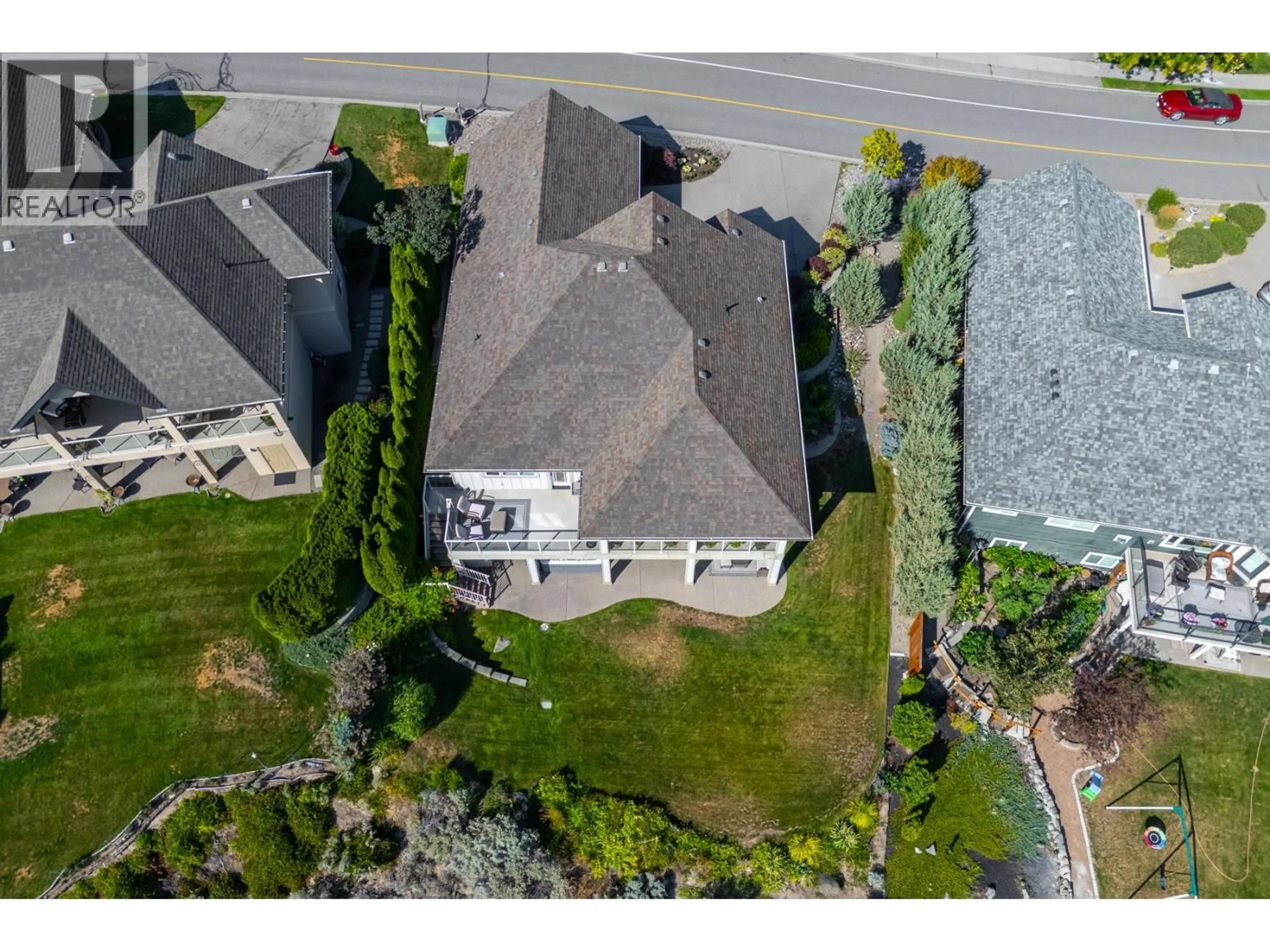 A pic from outside/outdoor area/front of a property/back of a property/a pic from drone, street for 1160 CANYON RIDGE DRIVE, Kamloops British Columbia V2H0A1