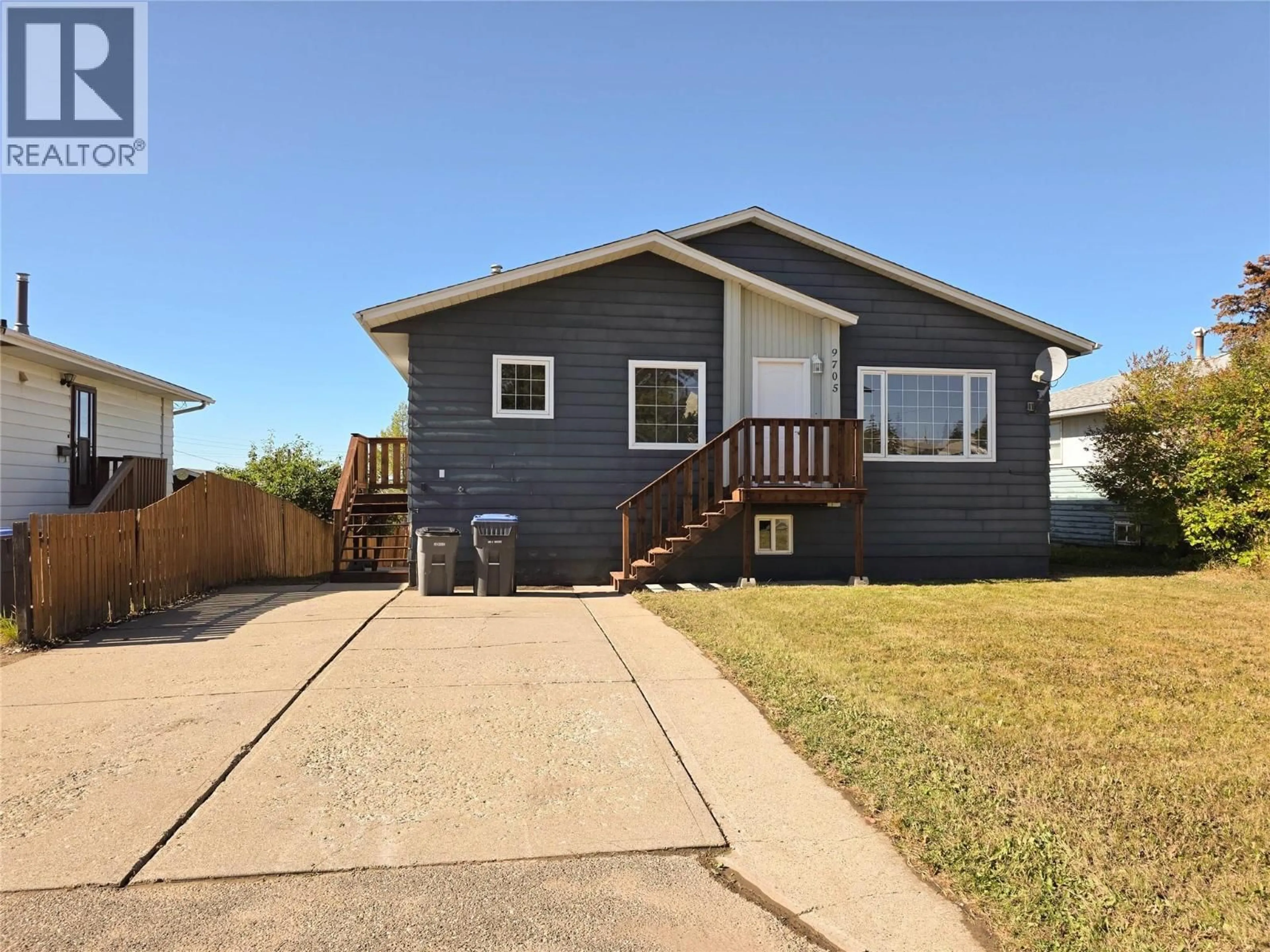 Home with vinyl exterior material, street for 9705 10 STREET, Dawson Creek British Columbia V1G3S9