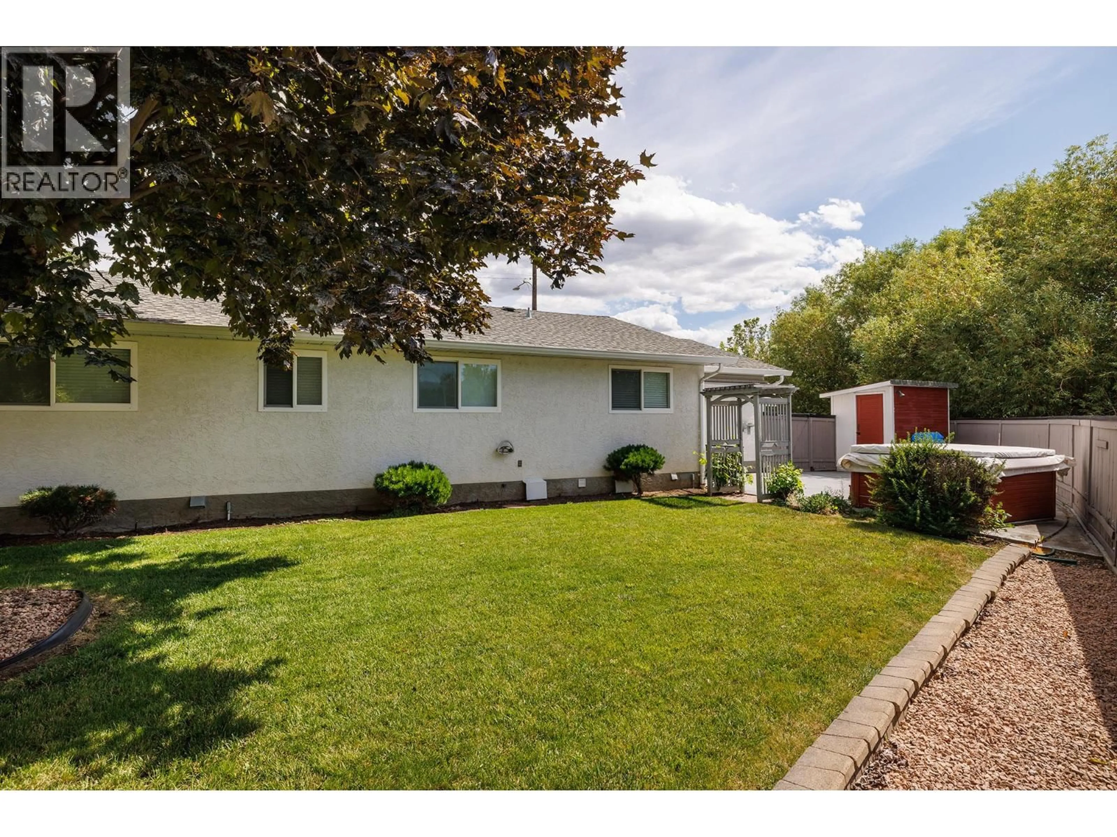 Home with vinyl exterior material, street for 1089 QUESNEL ROAD, Kelowna British Columbia V1Y3J4