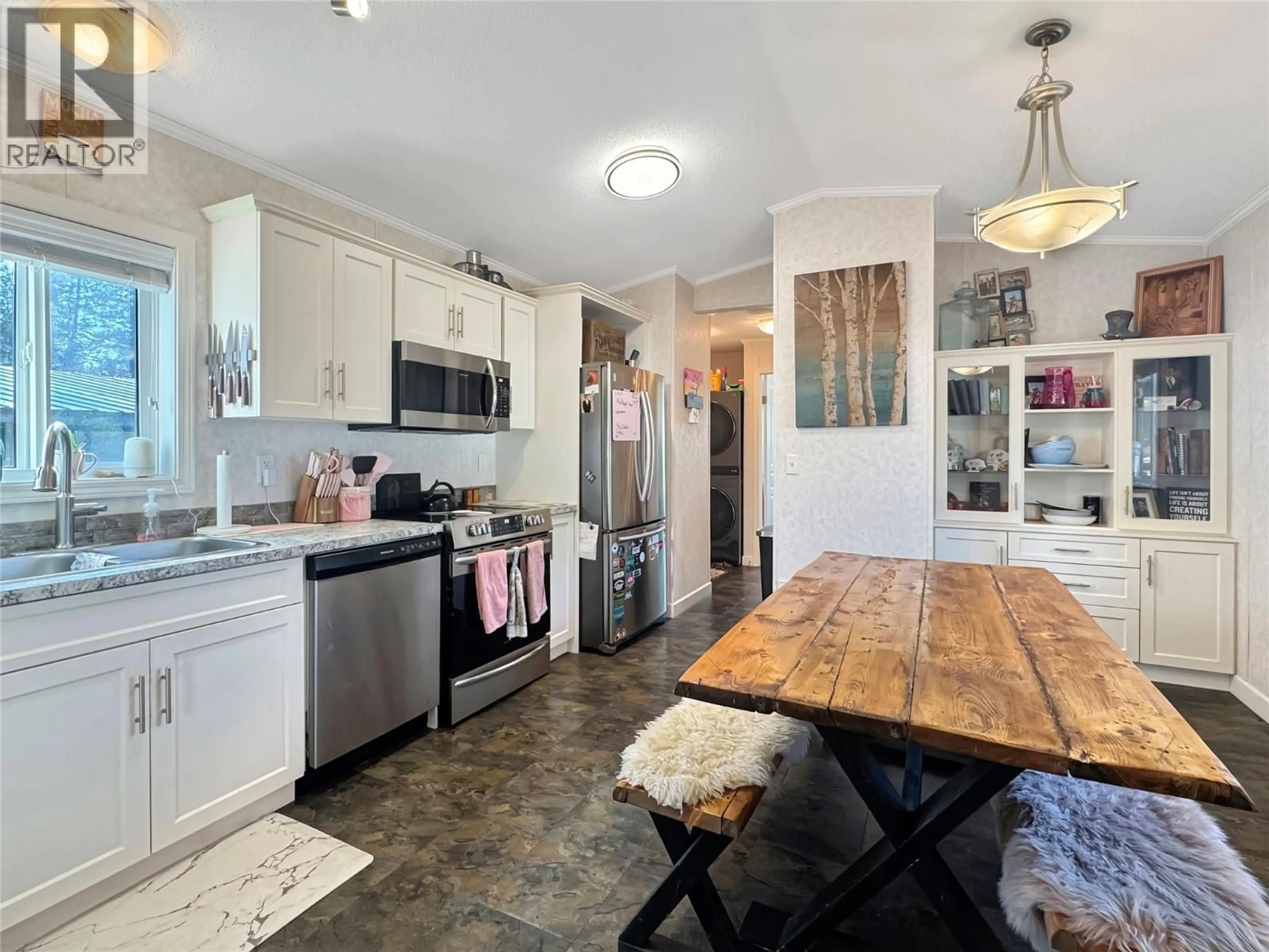 Open concept kitchen, wood/laminate floor for 2 - 8470 CAITHNESS ROAD, Elko British Columbia V0B1T0