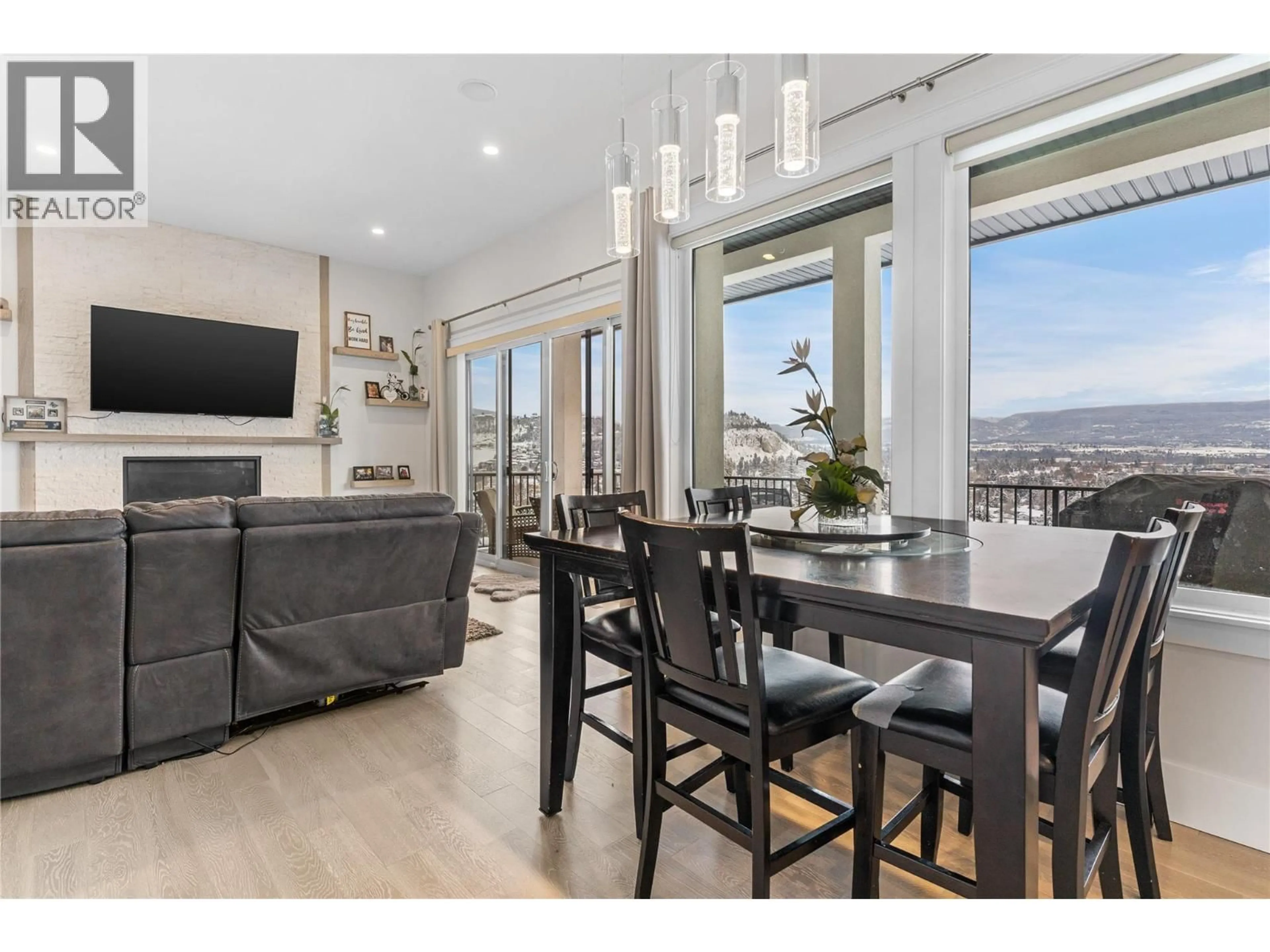Open concept kitchen, wood/laminate floor for 1325 SLADEN CRESCENT, Kelowna British Columbia V1V2Y1
