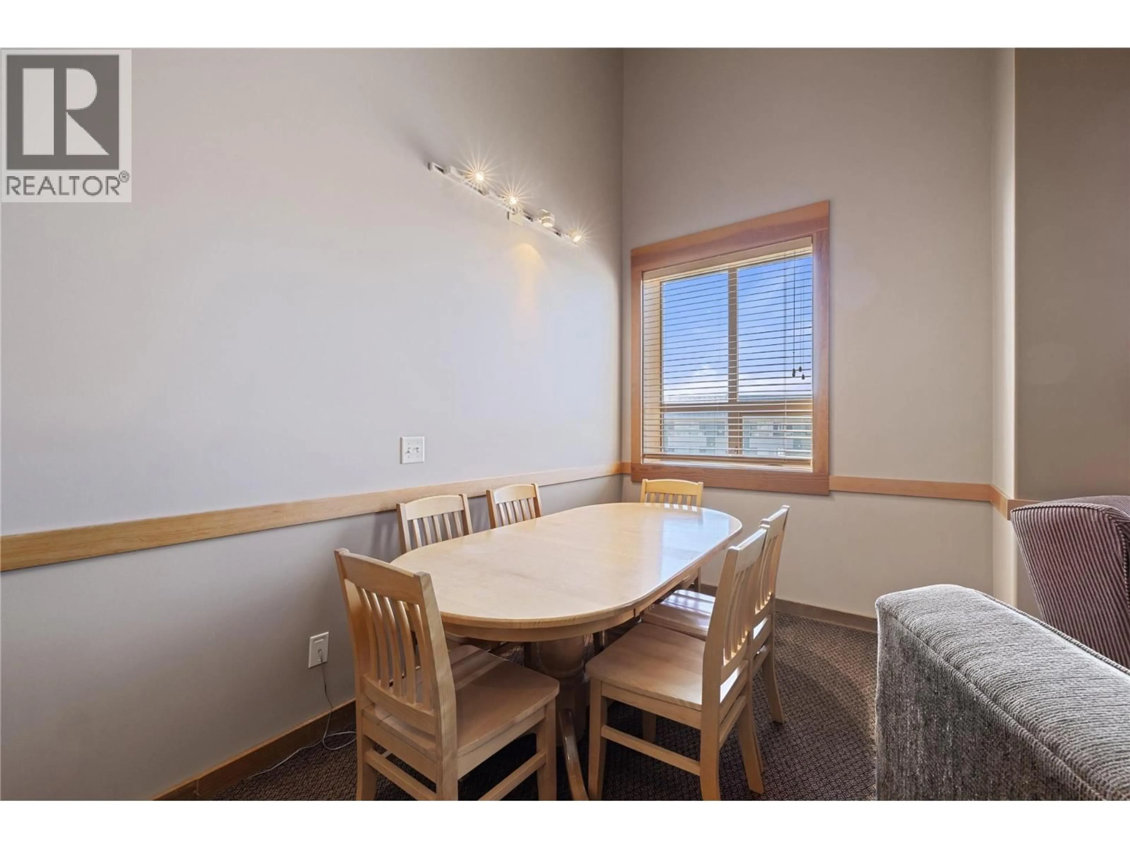 Dining room, wood/laminate floor for 206 - 5335 BIG WHITE ROAD, Big White British Columbia V1P1P3
