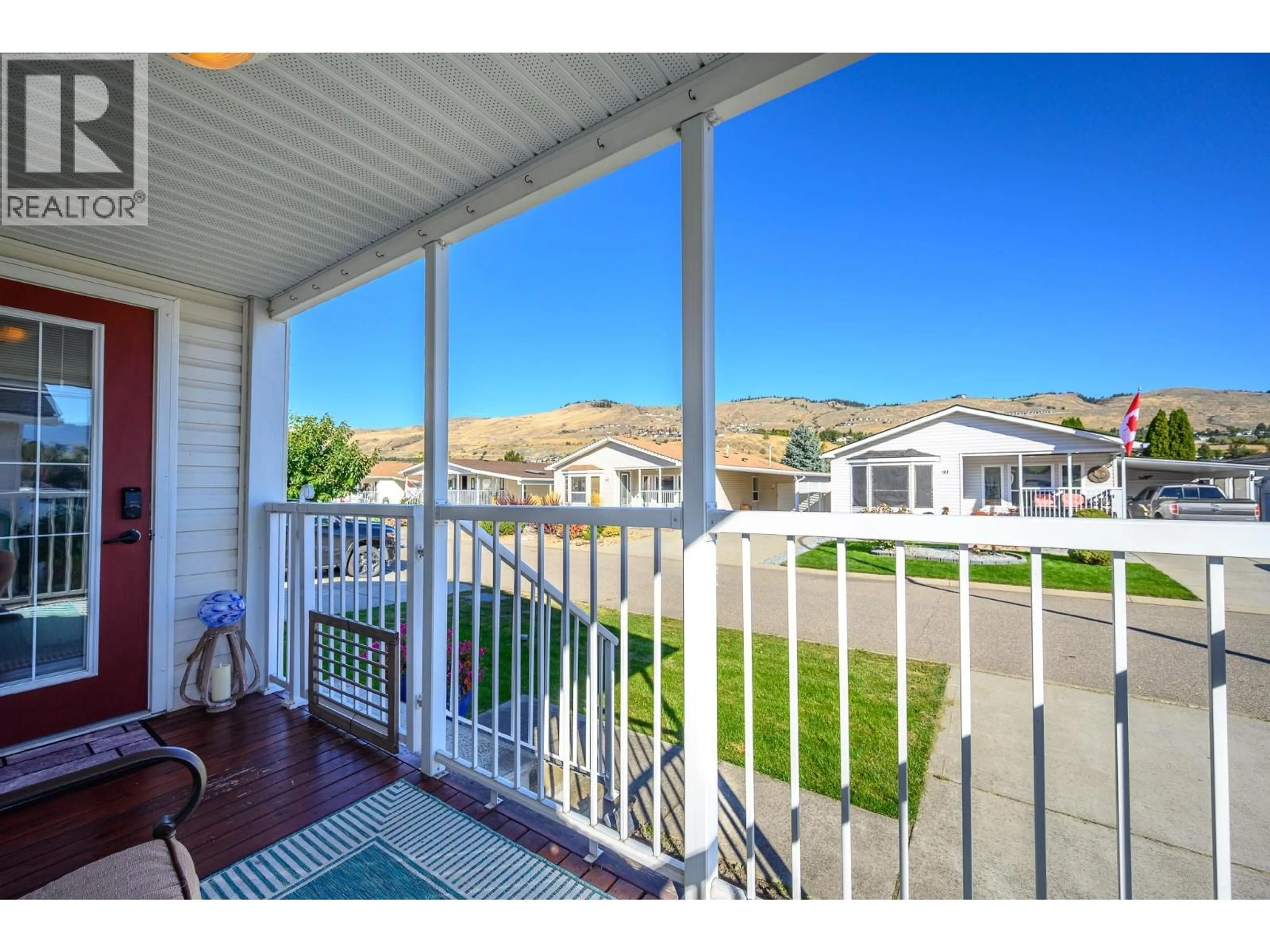 Patio, water/lake/river/ocean view for 105 - 6688 TRONSON ROAD, Vernon British Columbia V1H1R9