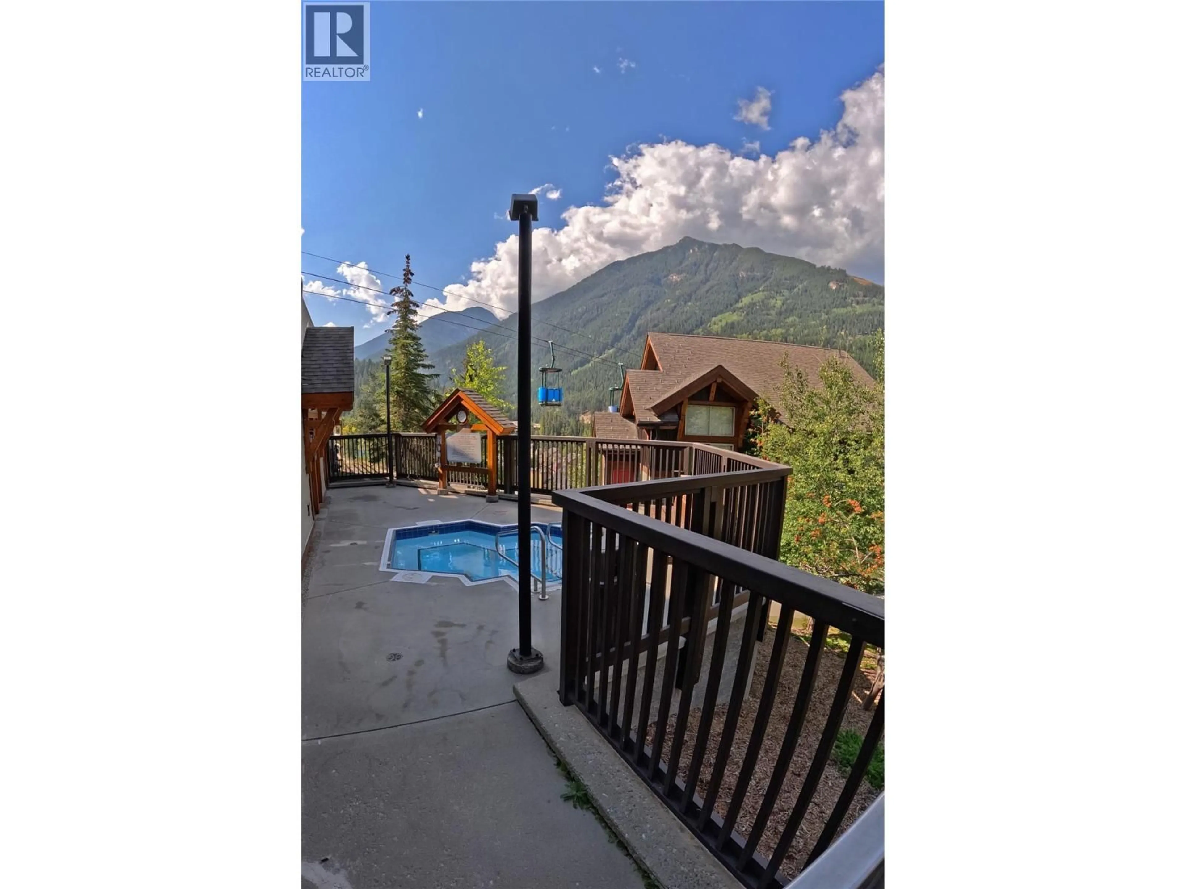 A pic from outside/outdoor area/front of a property/back of a property/a pic from drone, unknown for 212A - 2049 SUMMIT DRIVE, Panorama British Columbia V0A1T0