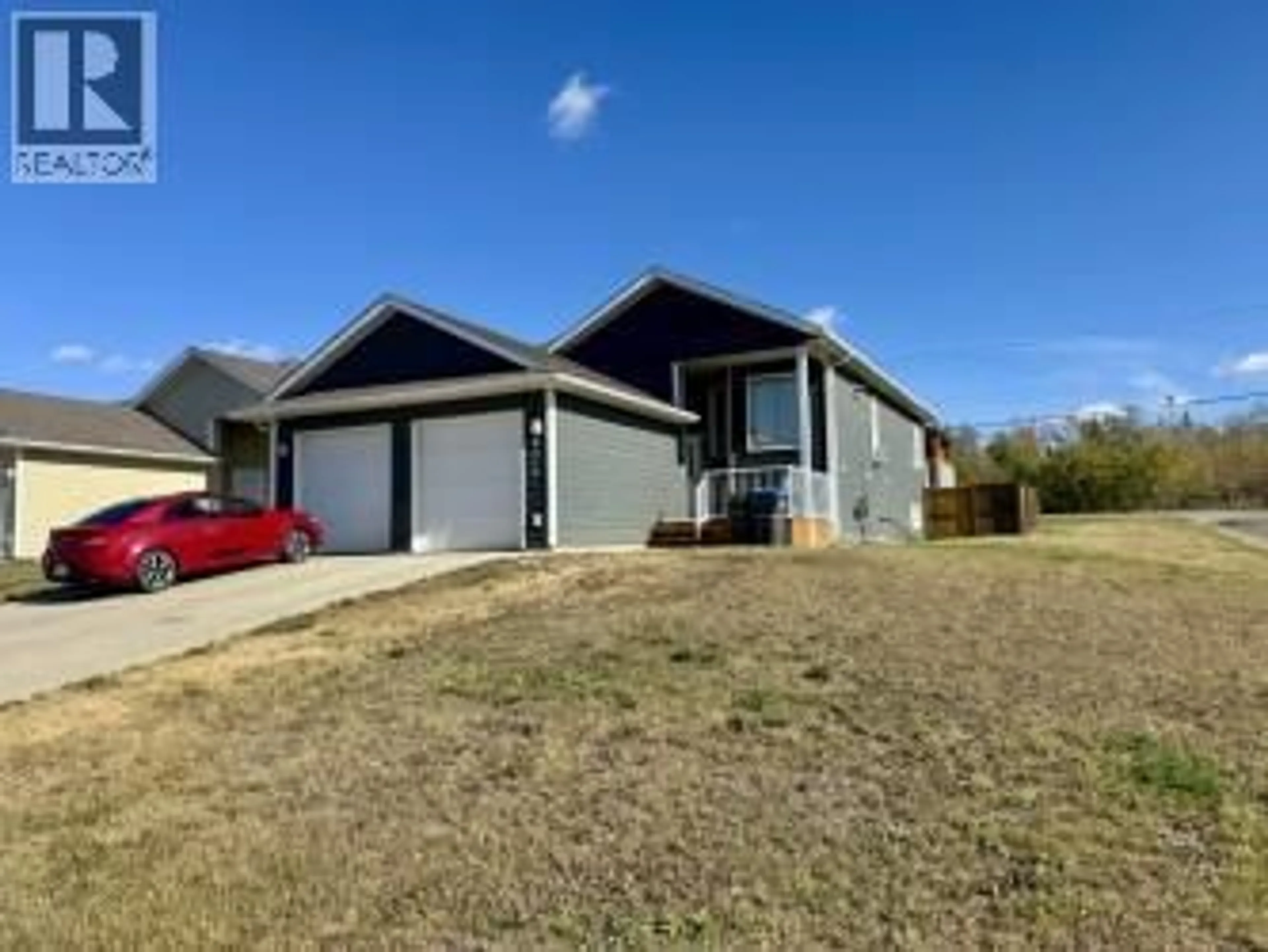 Home with vinyl exterior material, street for 8216 17A STREET, Dawson Creek British Columbia V1G0G6