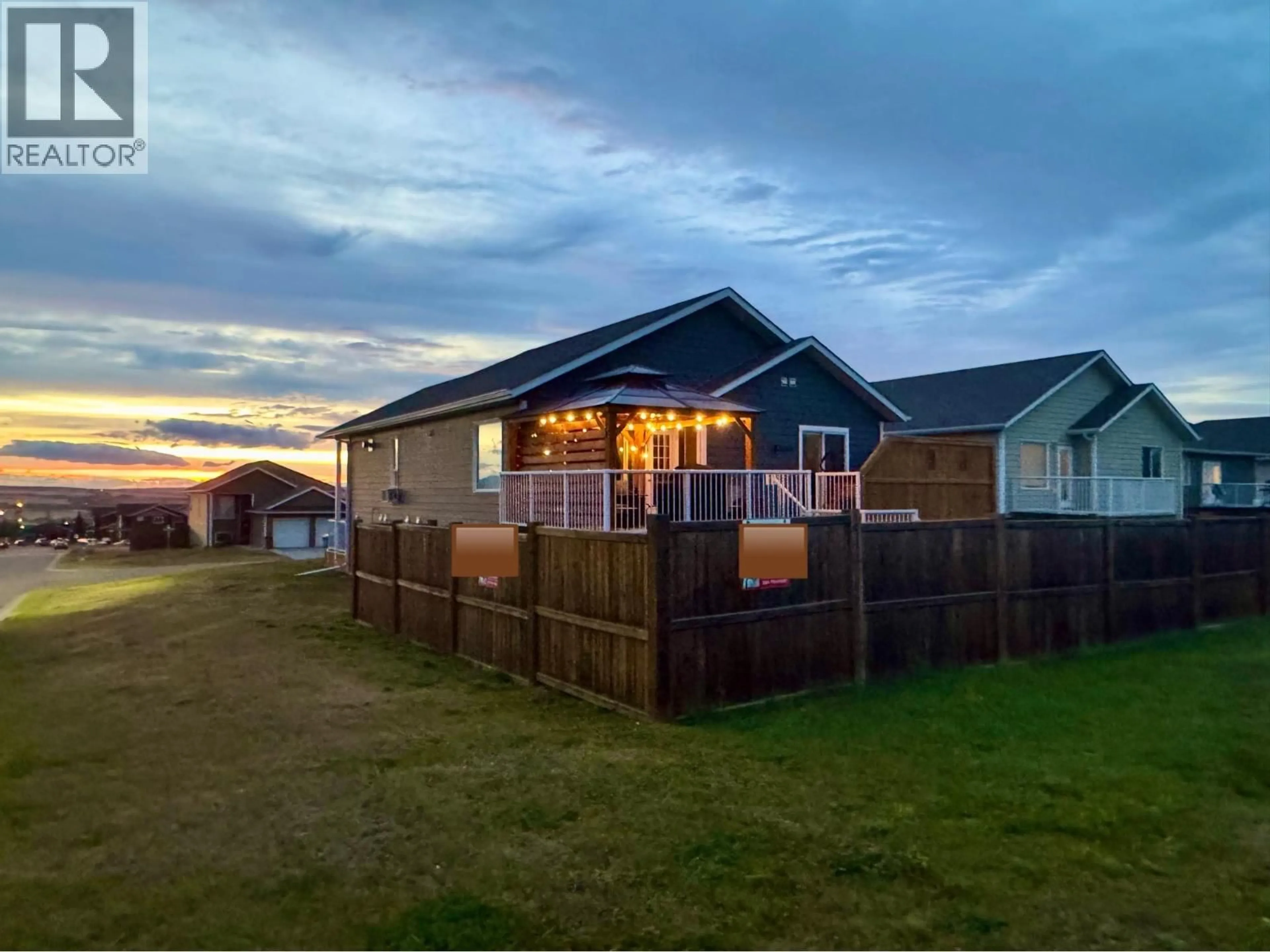 A pic from outside/outdoor area/front of a property/back of a property/a pic from drone, building for 8216 17A STREET, Dawson Creek British Columbia V1G0G6
