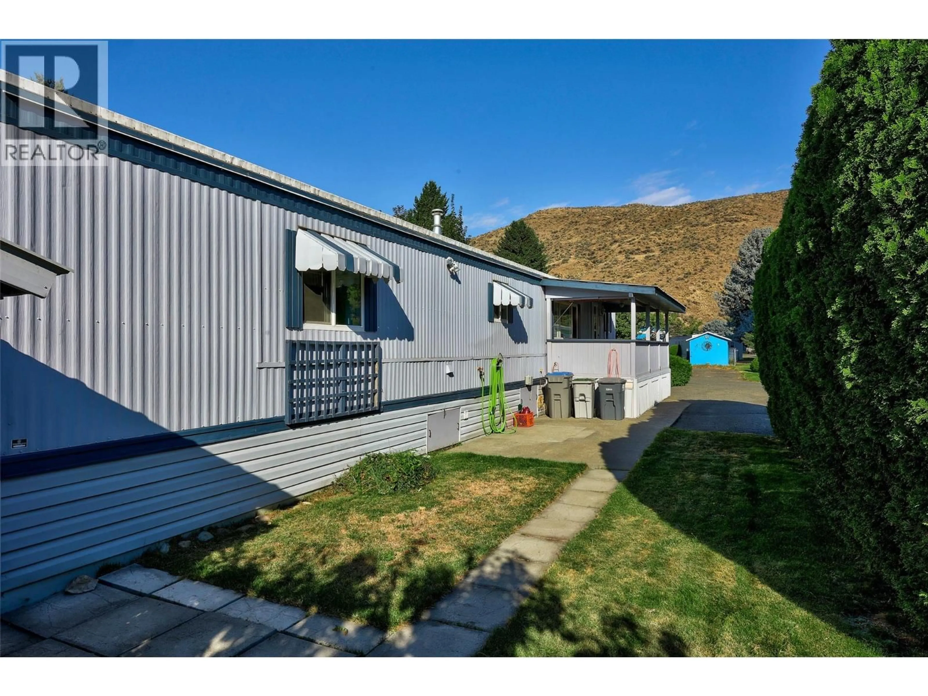 A pic from outside/outdoor area/front of a property/back of a property/a pic from drone, mountain view for 52 - 2401 ORD ROAD, Kamloops British Columbia V2B7V8