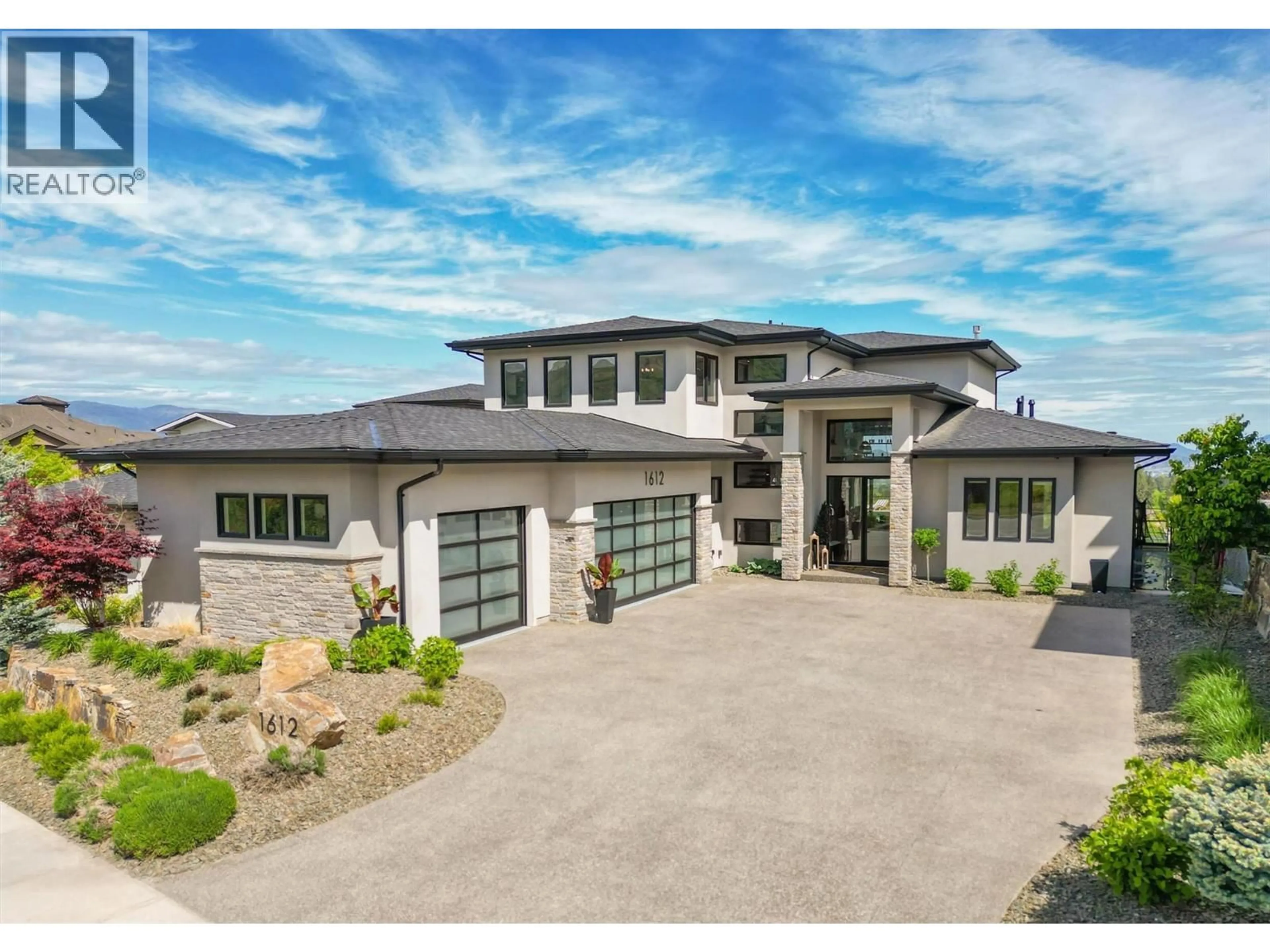 Home with brick exterior material, unknown for 1612 VINCENT PLACE, Kelowna British Columbia V1W5N9