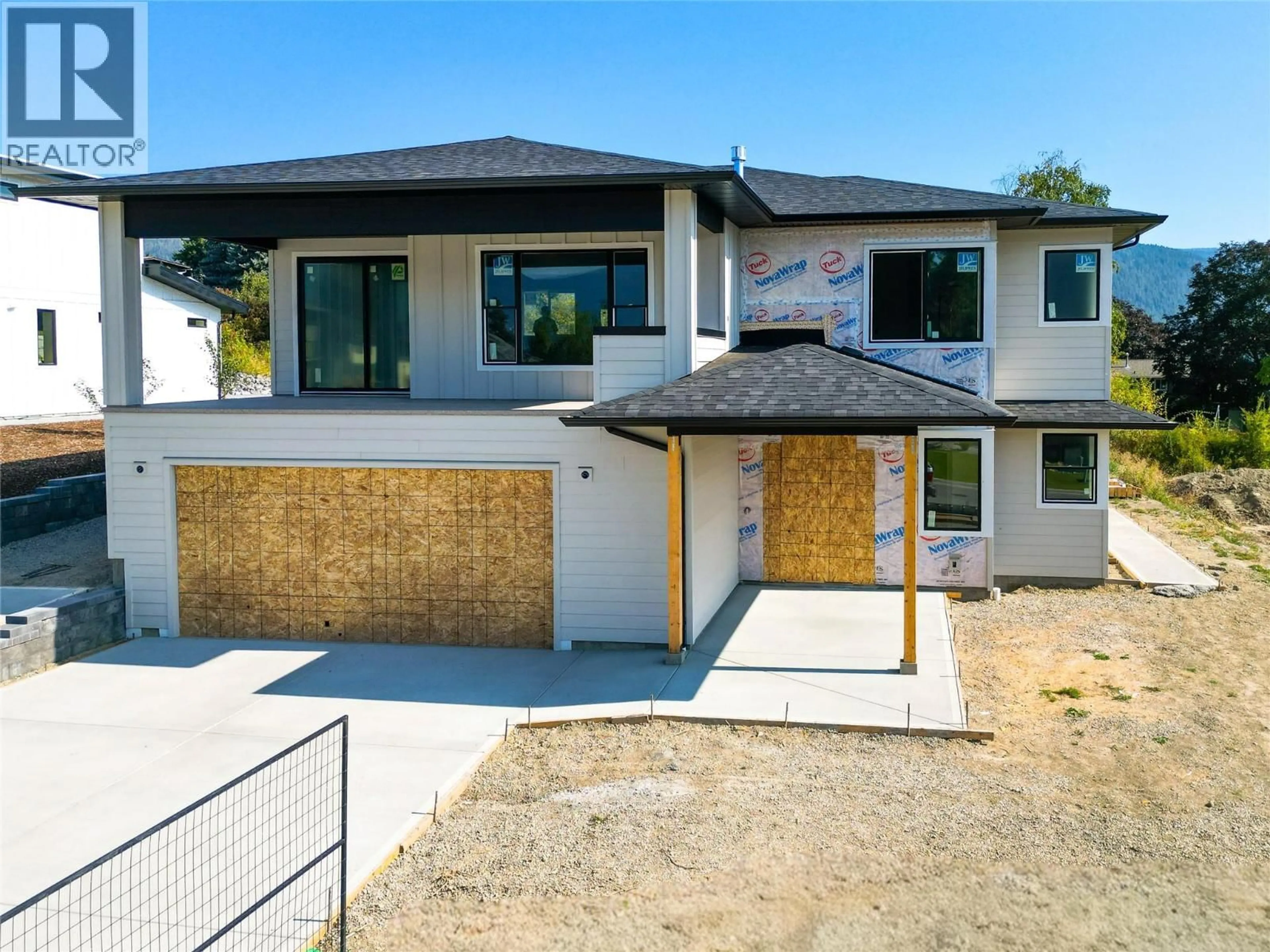 Home with brick exterior material, street for 1770 35 STREET NORTHEAST, Salmon Arm British Columbia V1E1M9