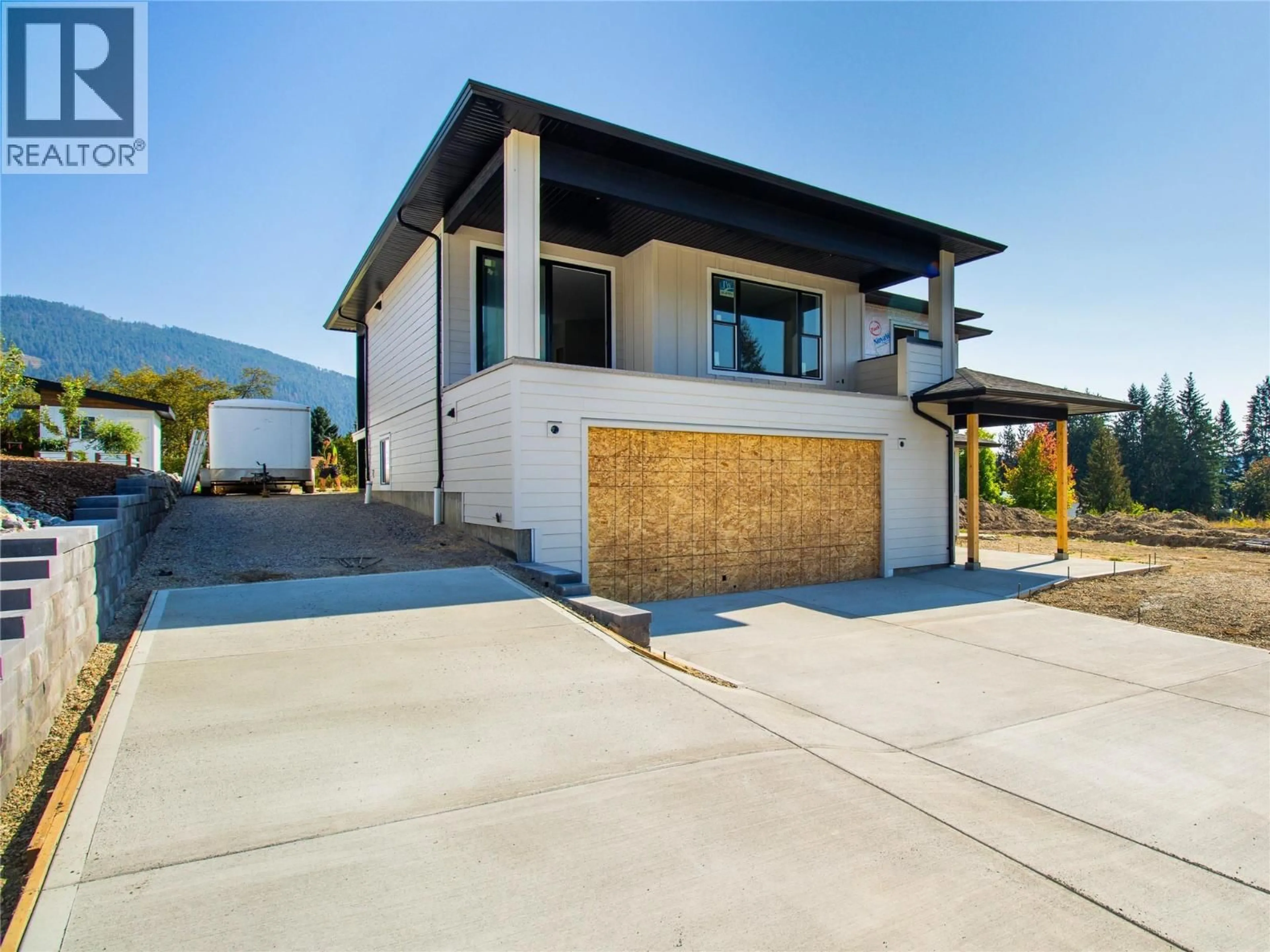 Home with brick exterior material, street for 1770 35 STREET NORTHEAST, Salmon Arm British Columbia V1E1M9