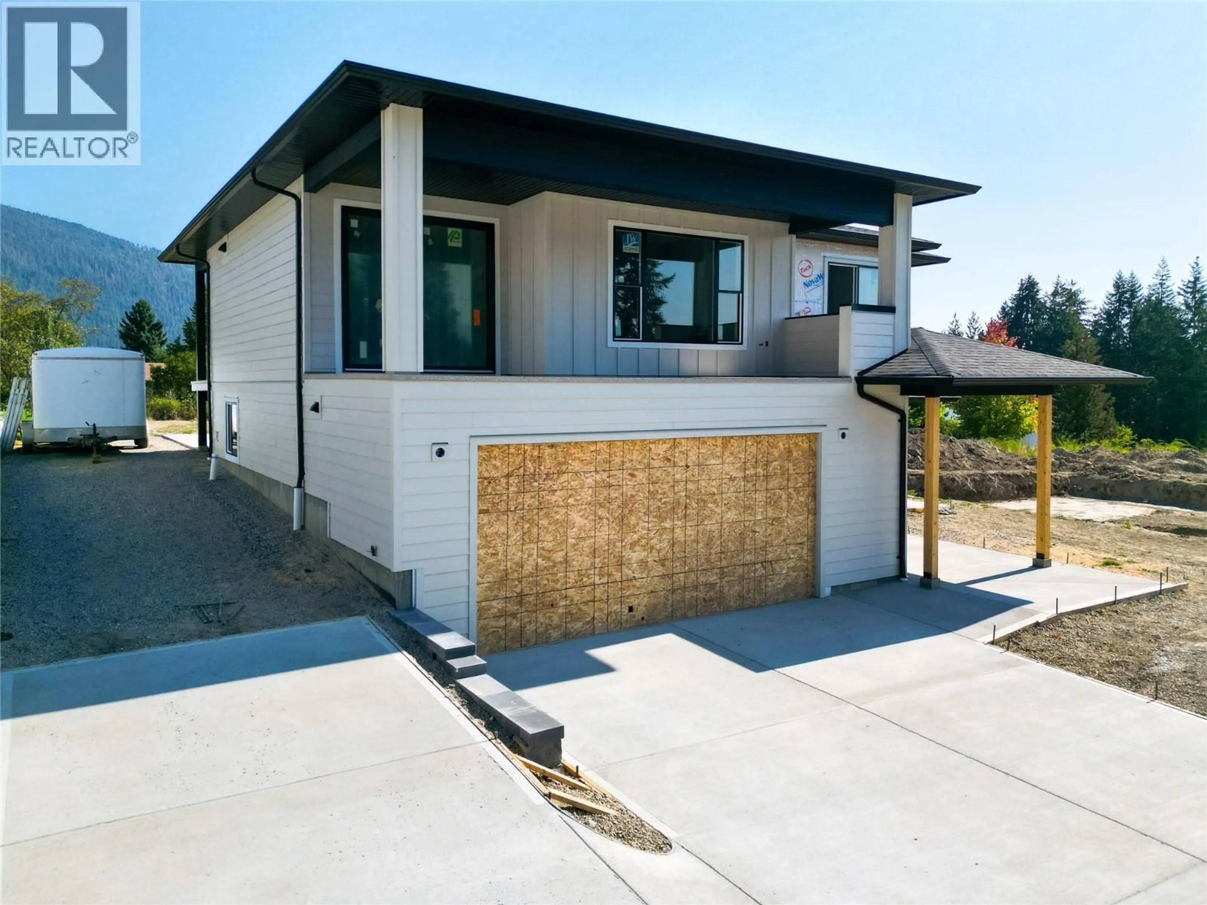 Home with brick exterior material, street for 1770 35 STREET NORTHEAST, Salmon Arm British Columbia V1E1M9