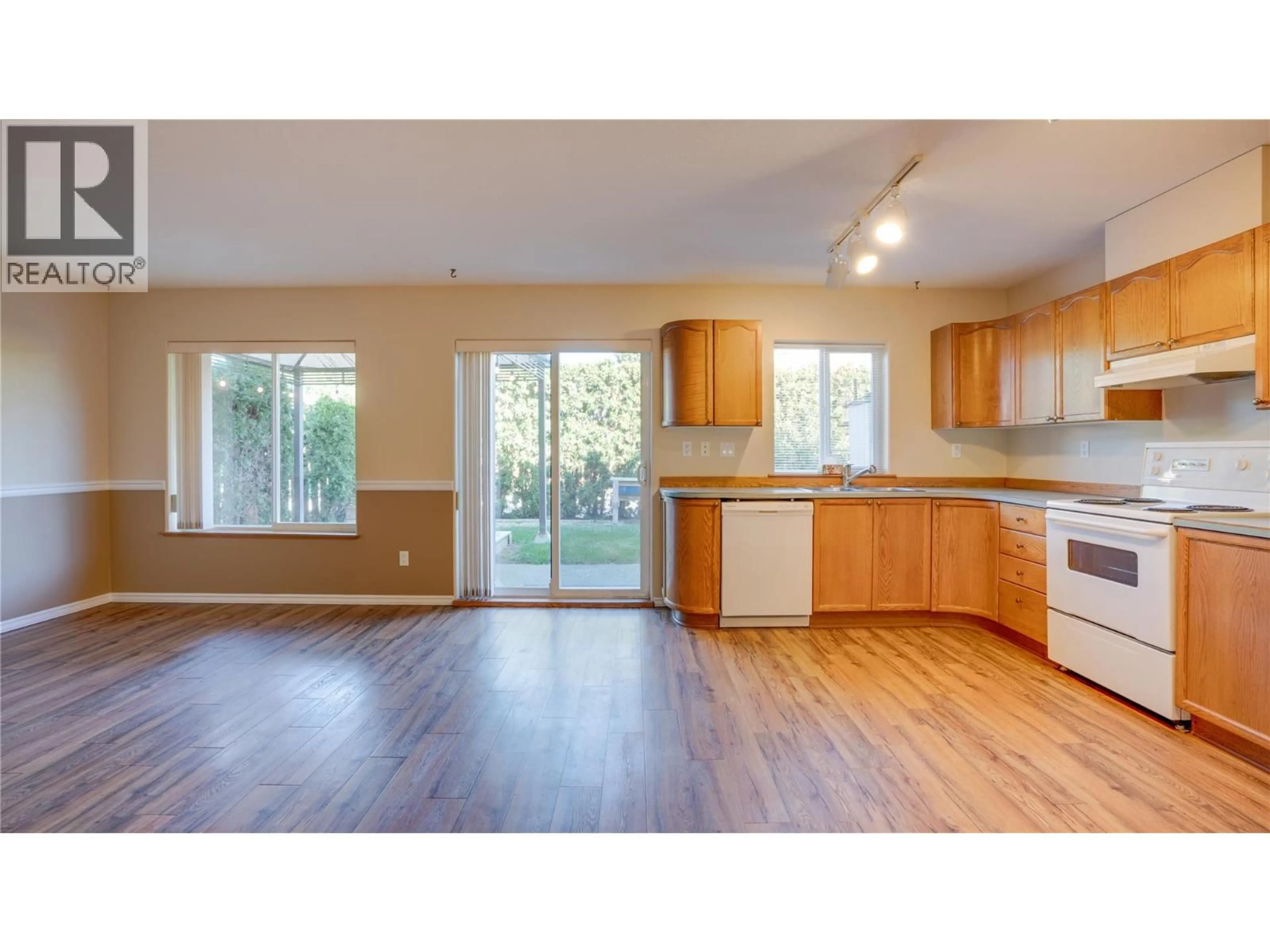 Open concept kitchen, wood/laminate floor for 1 - 2620 PLEASANT VALLEY ROAD, Armstrong British Columbia V4Y2A5