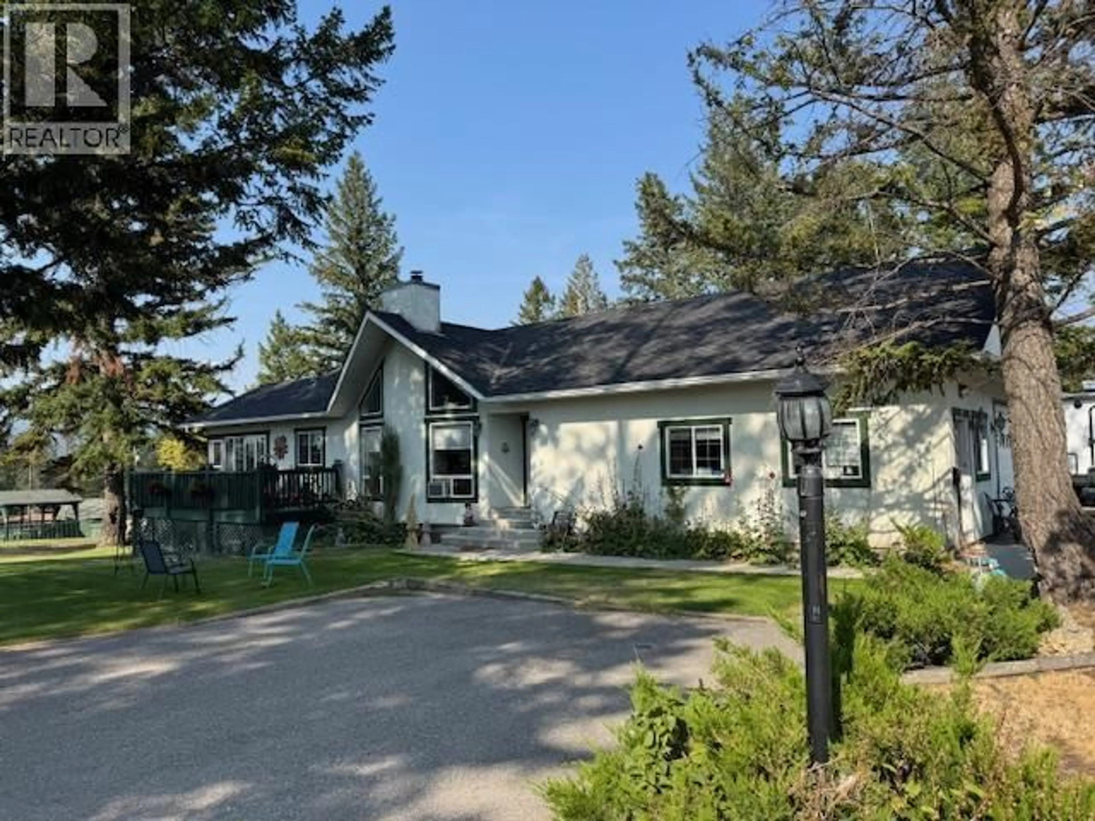 A pic from outside/outdoor area/front of a property/back of a property/a pic from drone, unknown for 109 - 7369 PROSPECTOR AVENUE, Radium Hot Springs British Columbia V0A1M0