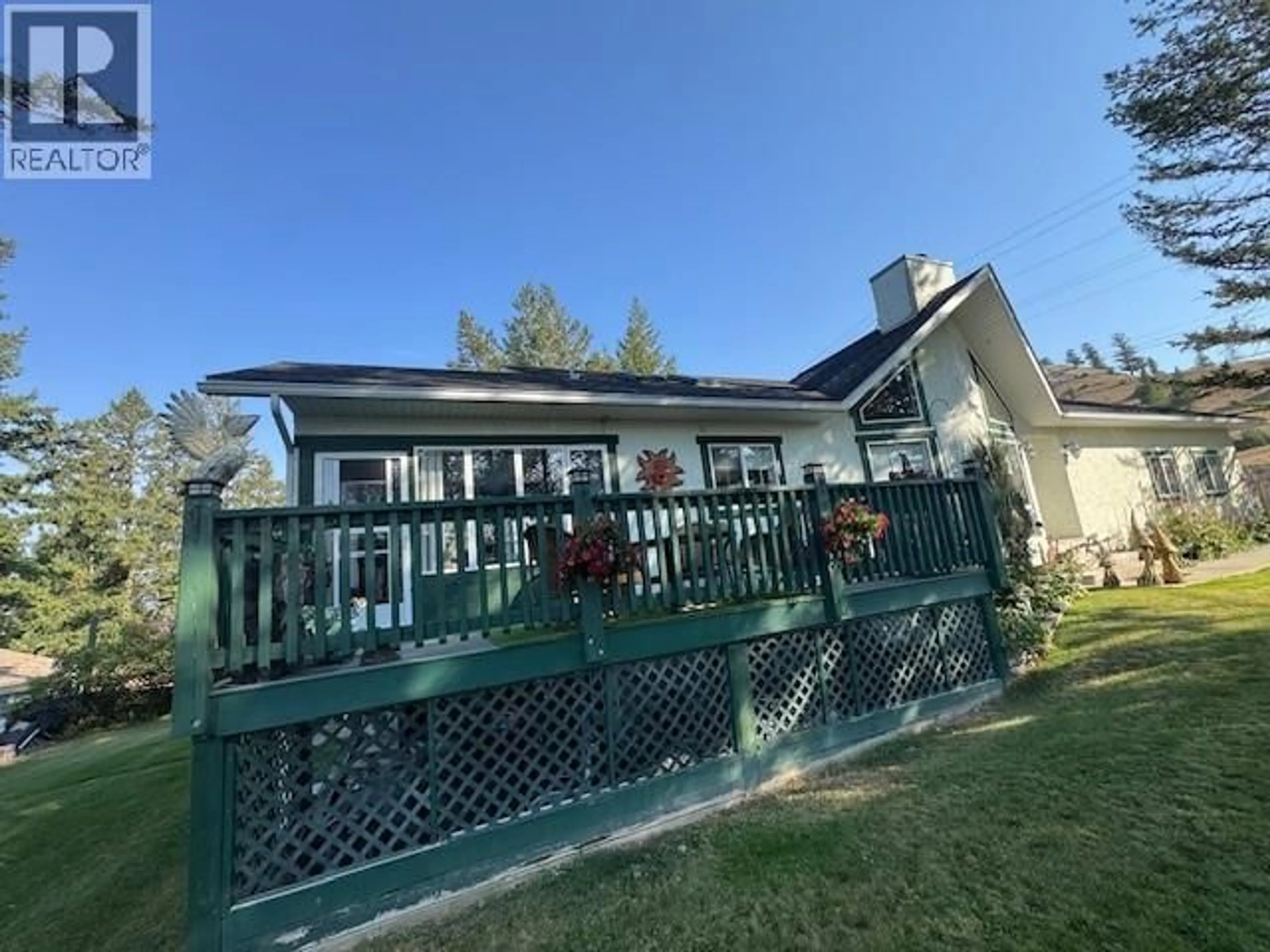 A pic from outside/outdoor area/front of a property/back of a property/a pic from drone, unknown for 109 - 7369 PROSPECTOR AVENUE, Radium Hot Springs British Columbia V0A1M0