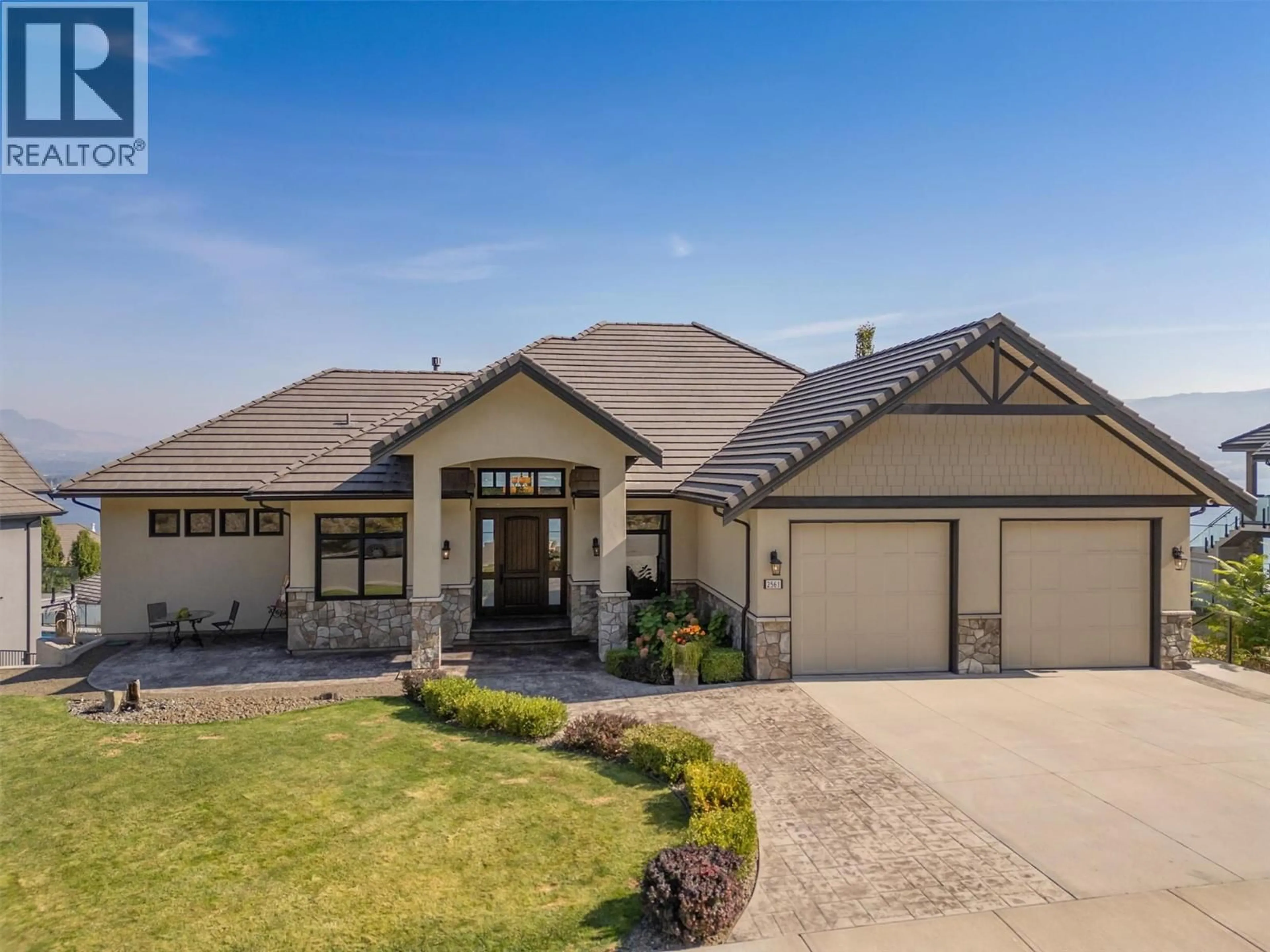 Home with brick exterior material, street for 2561 CASA PALMERO DRIVE, West Kelowna British Columbia V1Z4B1