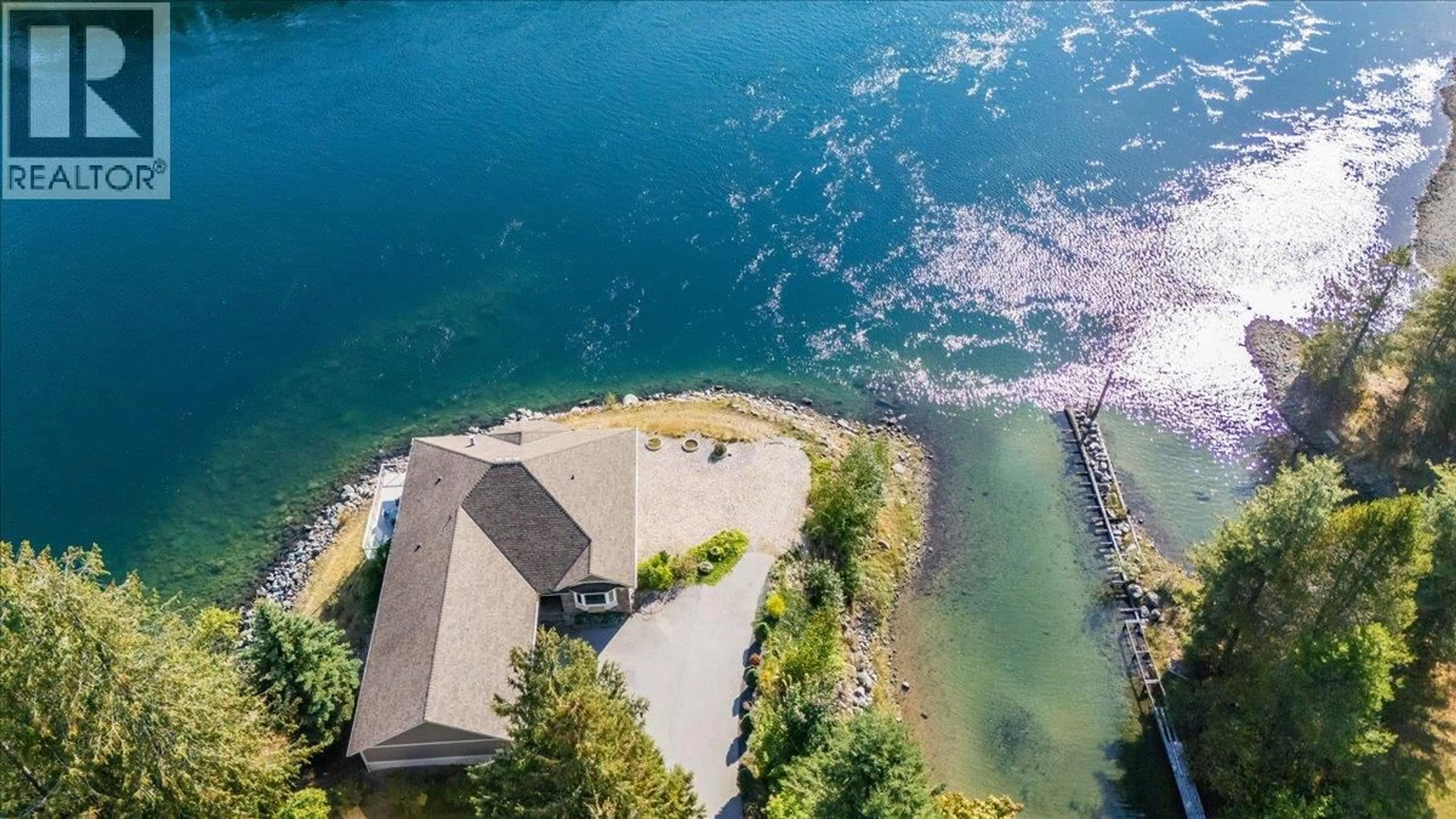 A pic from outside/outdoor area/front of a property/back of a property/a pic from drone, water/lake/river/ocean view for 48-7126 HIGHWAY 3A HIGHWAY, Nelson British Columbia V1L6S4