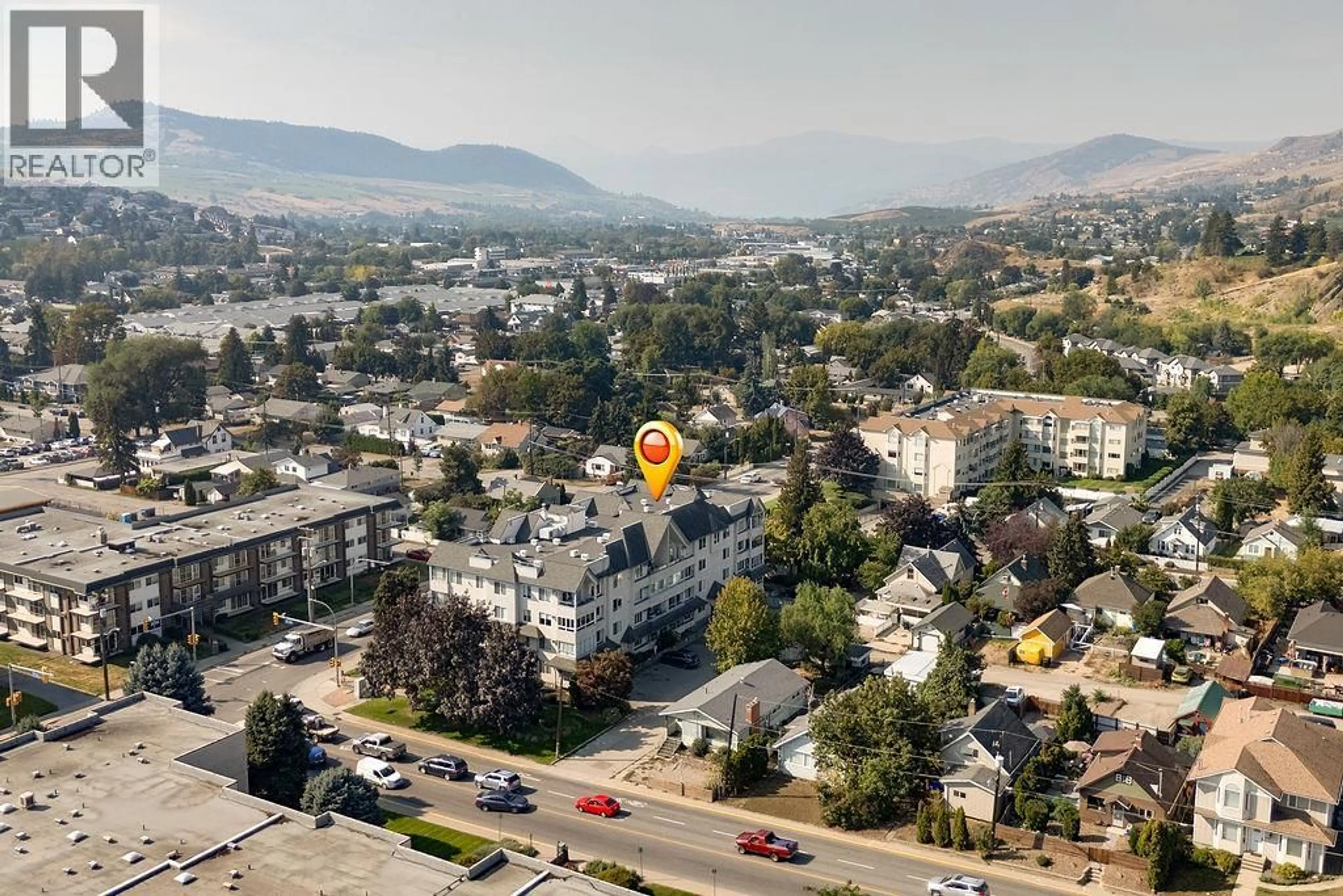 A pic from outside/outdoor area/front of a property/back of a property/a pic from drone, mountain view for 405 - 3705 30 AVENUE, Vernon British Columbia V1T2E7