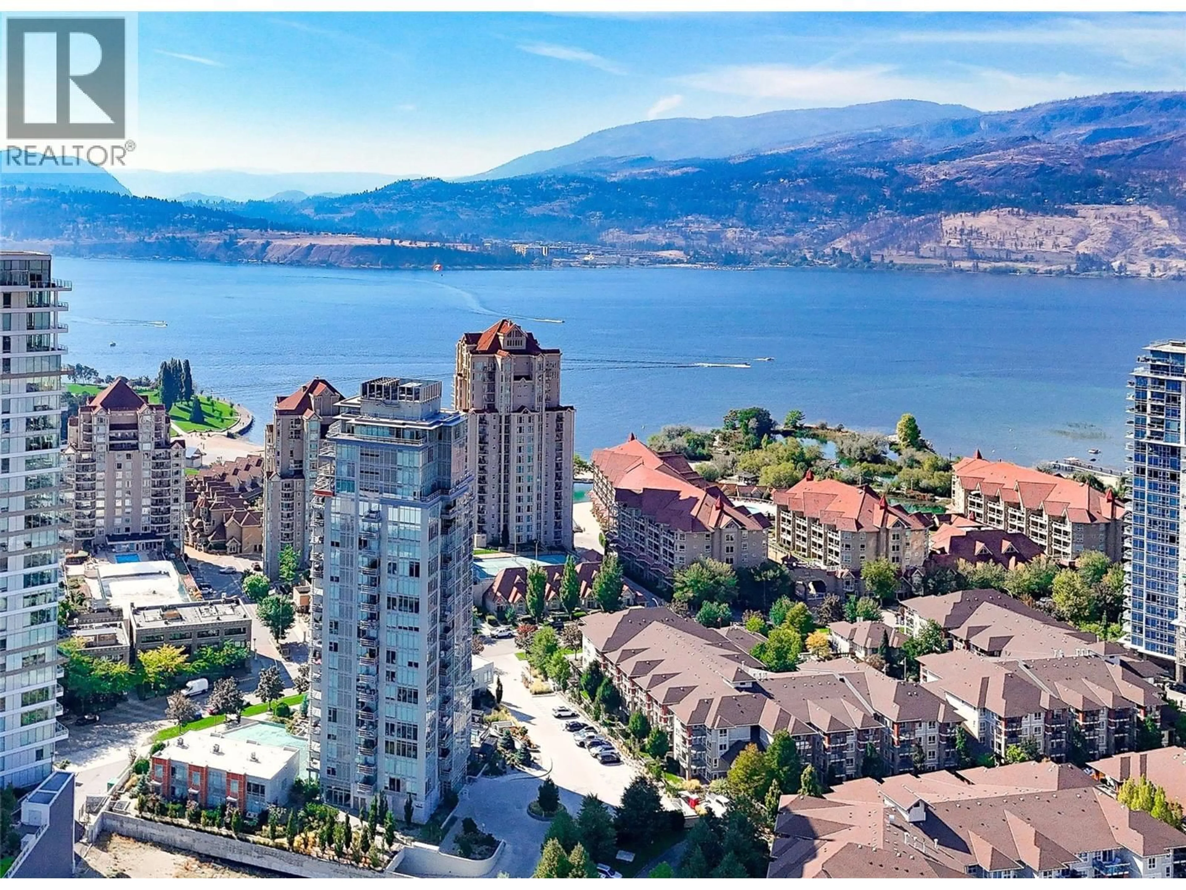 A pic from outside/outdoor area/front of a property/back of a property/a pic from drone, water/lake/river/ocean view for 103 - 1151 SUNSET DRIVE, Kelowna British Columbia V1Y0G2