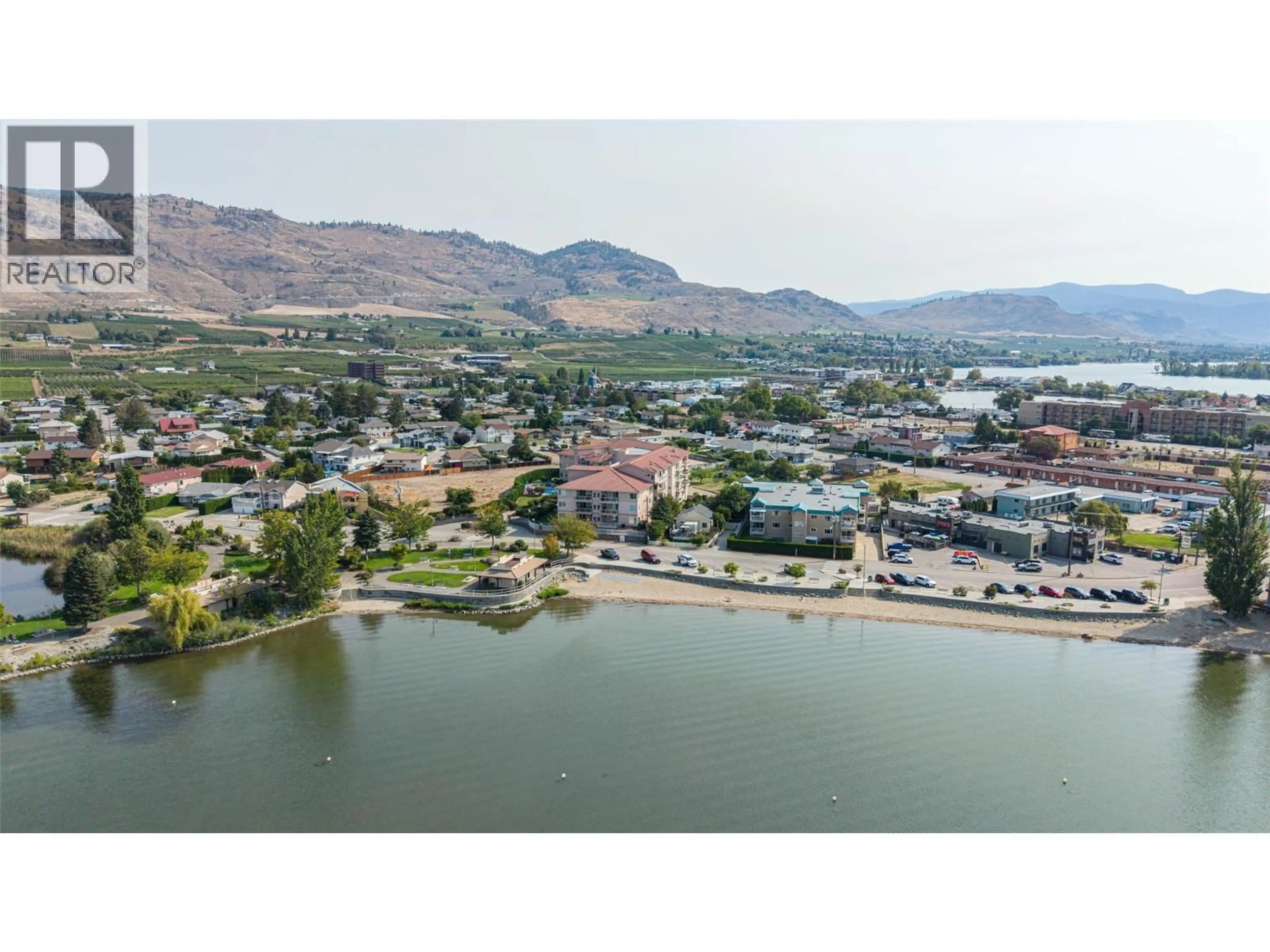 A pic from outside/outdoor area/front of a property/back of a property/a pic from drone, water/lake/river/ocean view for 300 - 6805 COTTONWOOD DRIVE, Osoyoos British Columbia V0H1V3