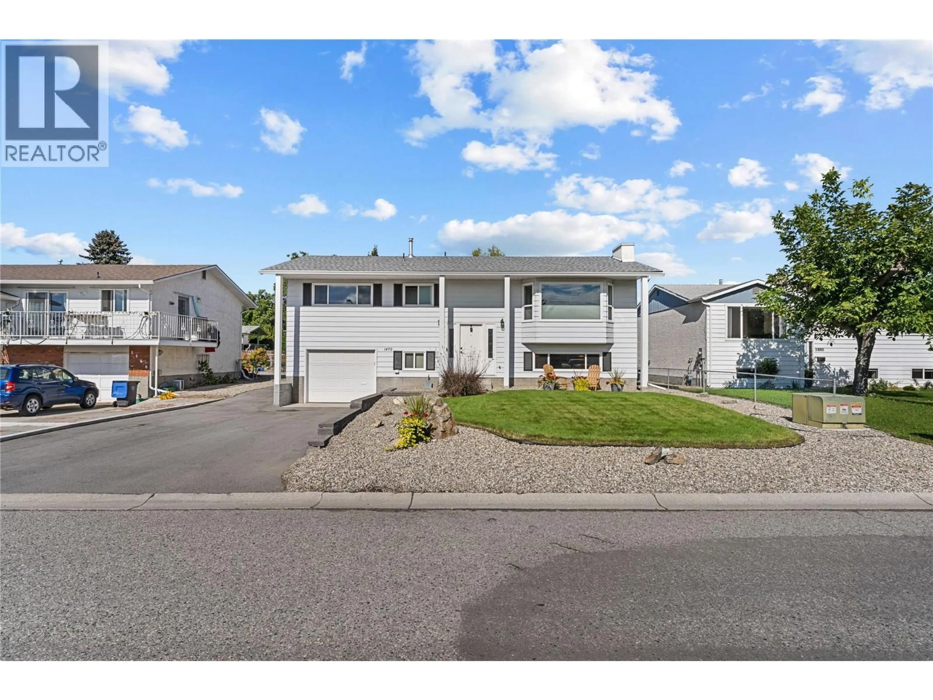 Home with vinyl exterior material, street for 1470 DENVER ROAD, Kelowna British Columbia V1Y8C2