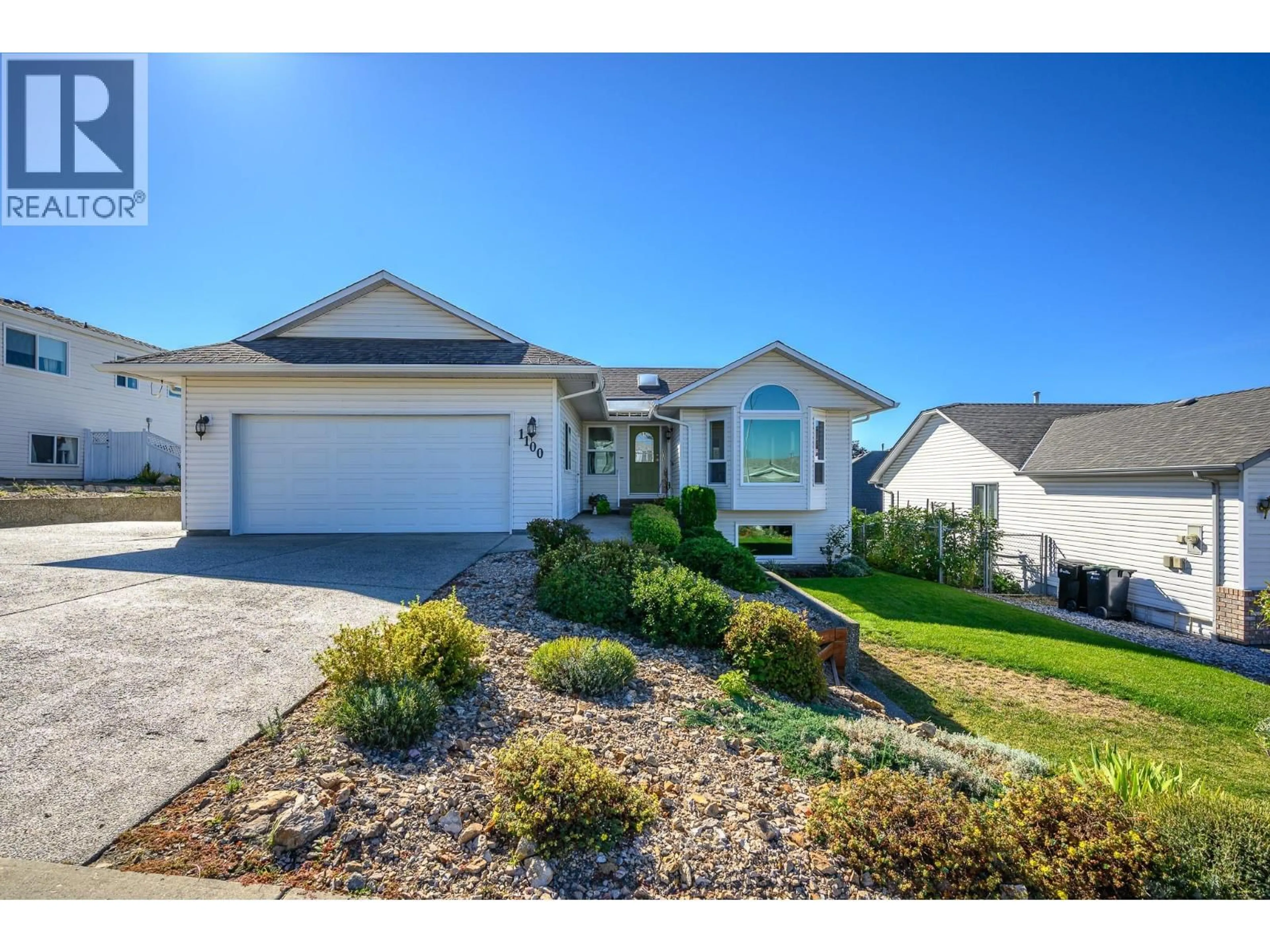 Home with vinyl exterior material, street for 1100 43 AVENUE, Vernon British Columbia V1T8C9