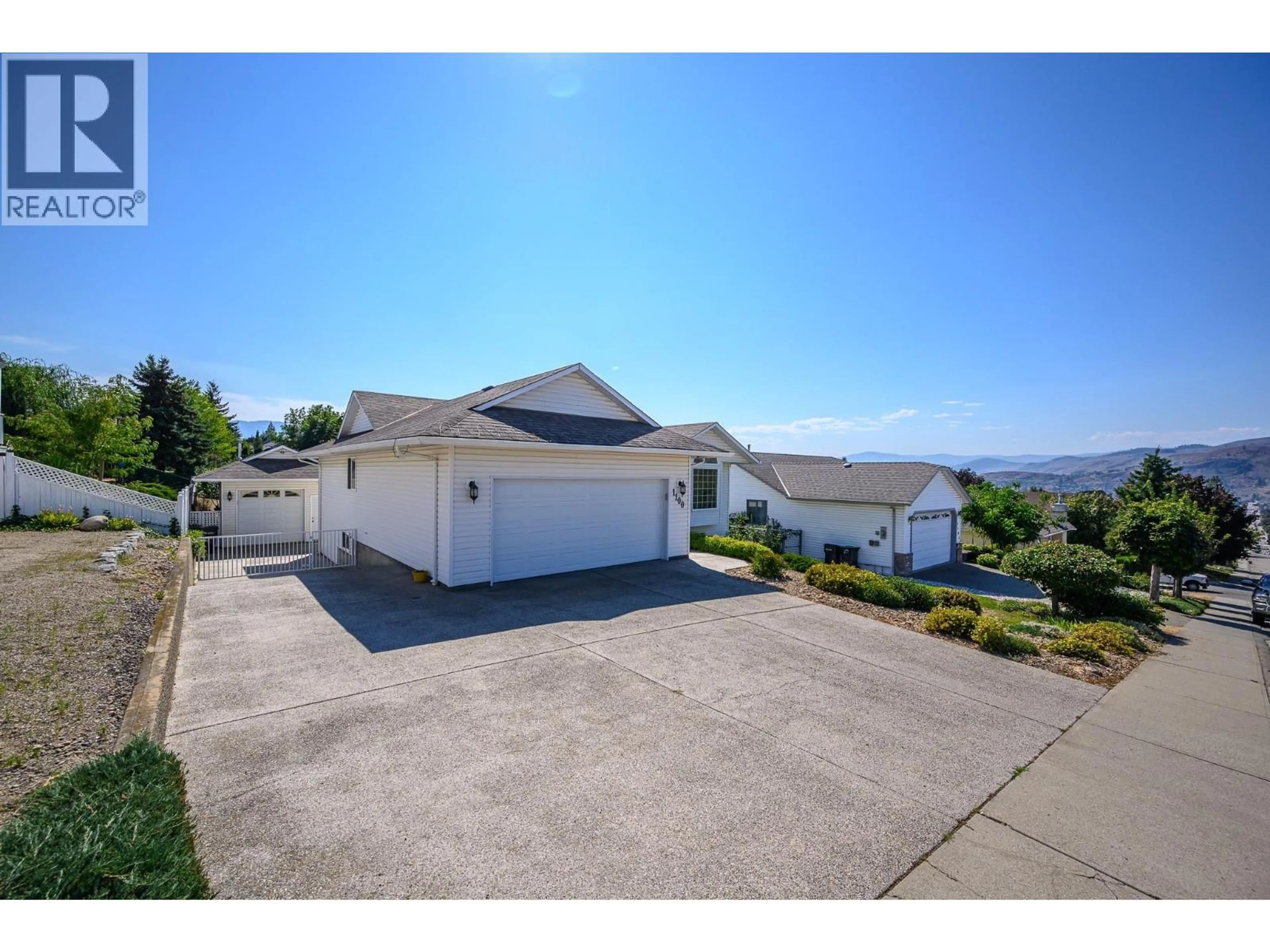 A pic from outside/outdoor area/front of a property/back of a property/a pic from drone, water/lake/river/ocean view for 1100 43 AVENUE, Vernon British Columbia V1T8C9