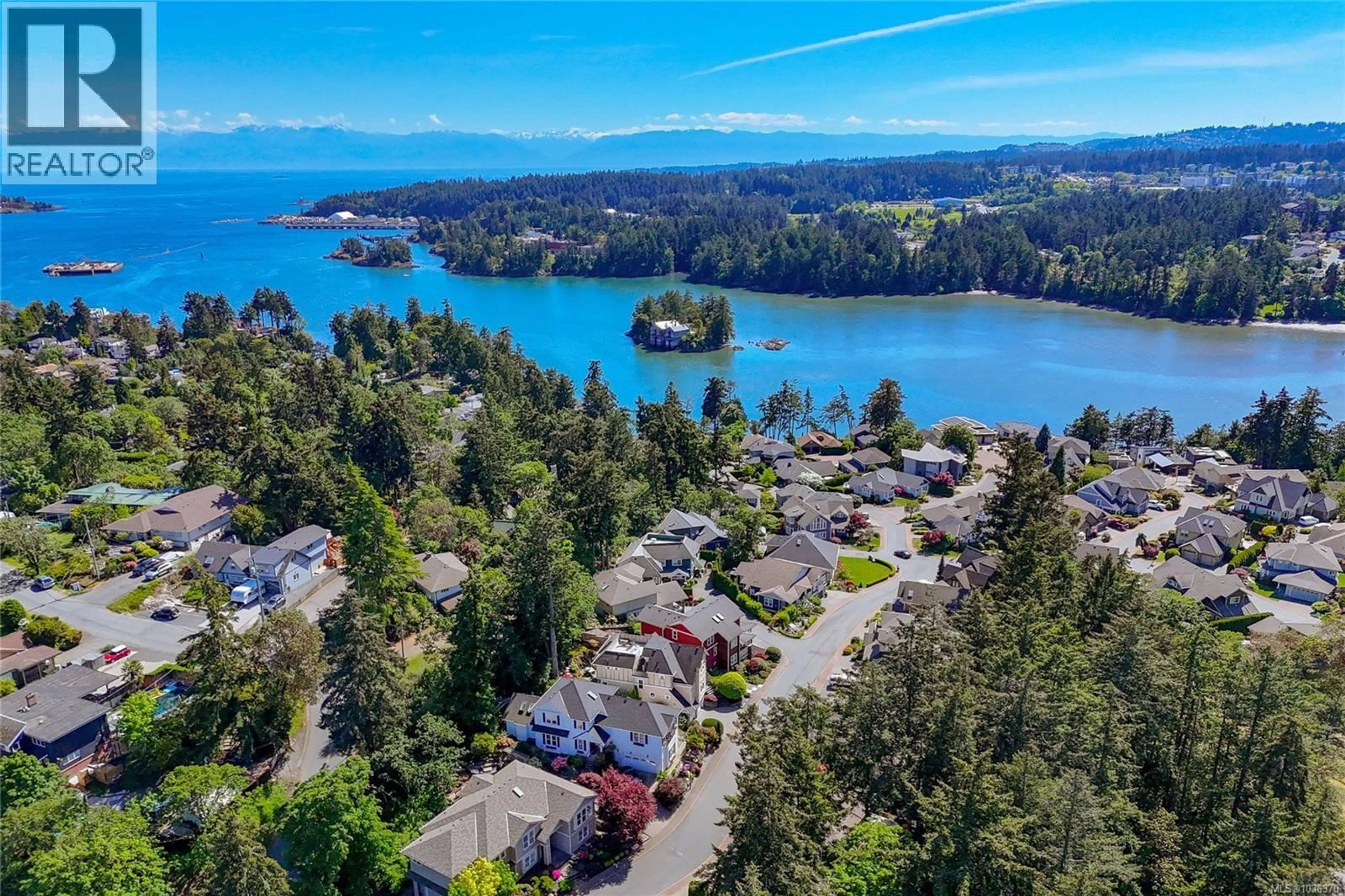 A pic from outside/outdoor area/front of a property/back of a property/a pic from drone, water/lake/river/ocean view for 118 GIBRALTAR BAY DRIVE, View Royal British Columbia V9B6M2