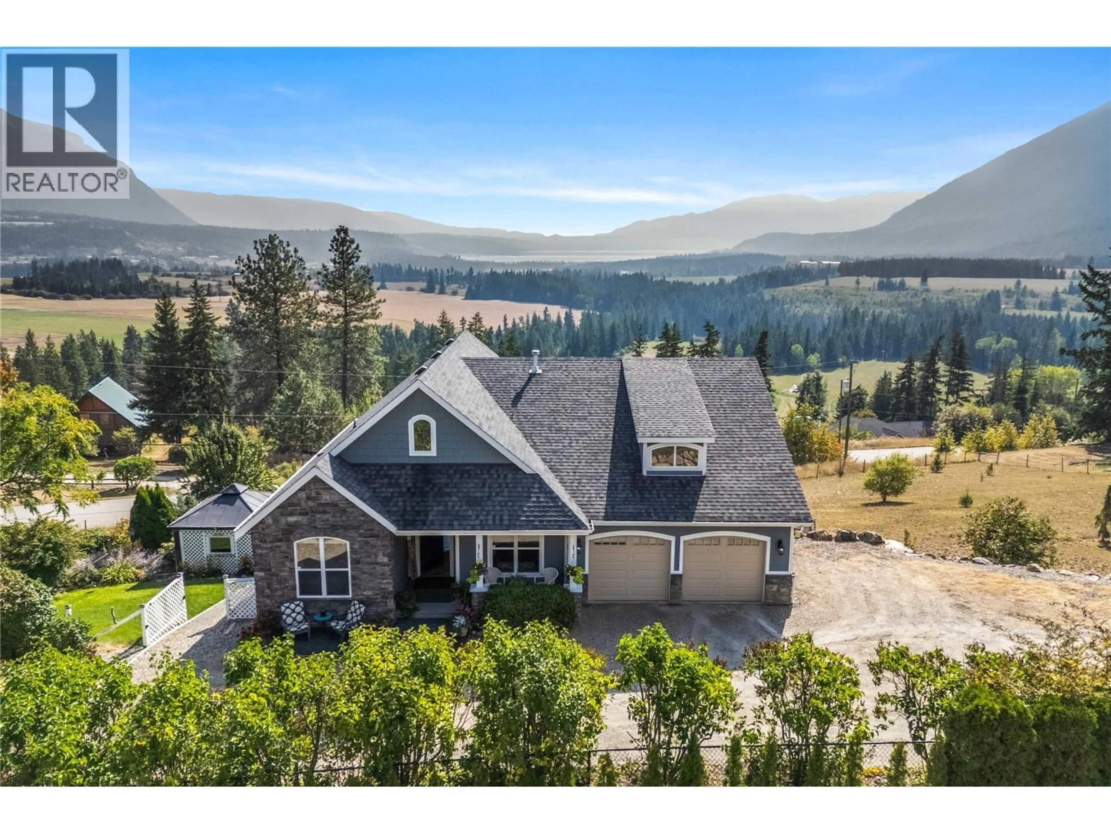 A pic from outside/outdoor area/front of a property/back of a property/a pic from drone, mountain view for 2754 SUN RIDGE PLACE, Tappen British Columbia V0E2X3