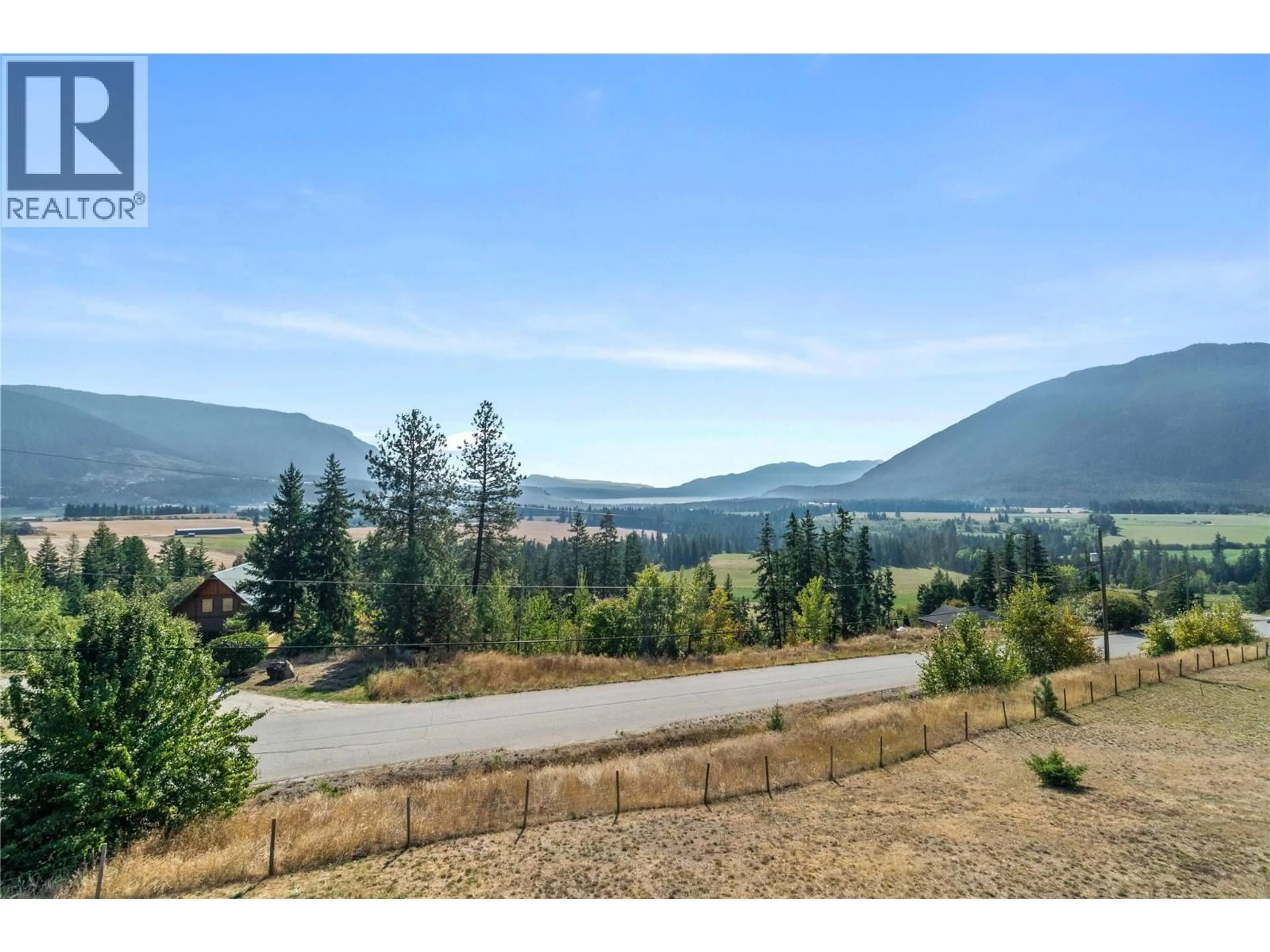 A pic from outside/outdoor area/front of a property/back of a property/a pic from drone, mountain view for 2754 SUN RIDGE PLACE, Tappen British Columbia V0E2X3