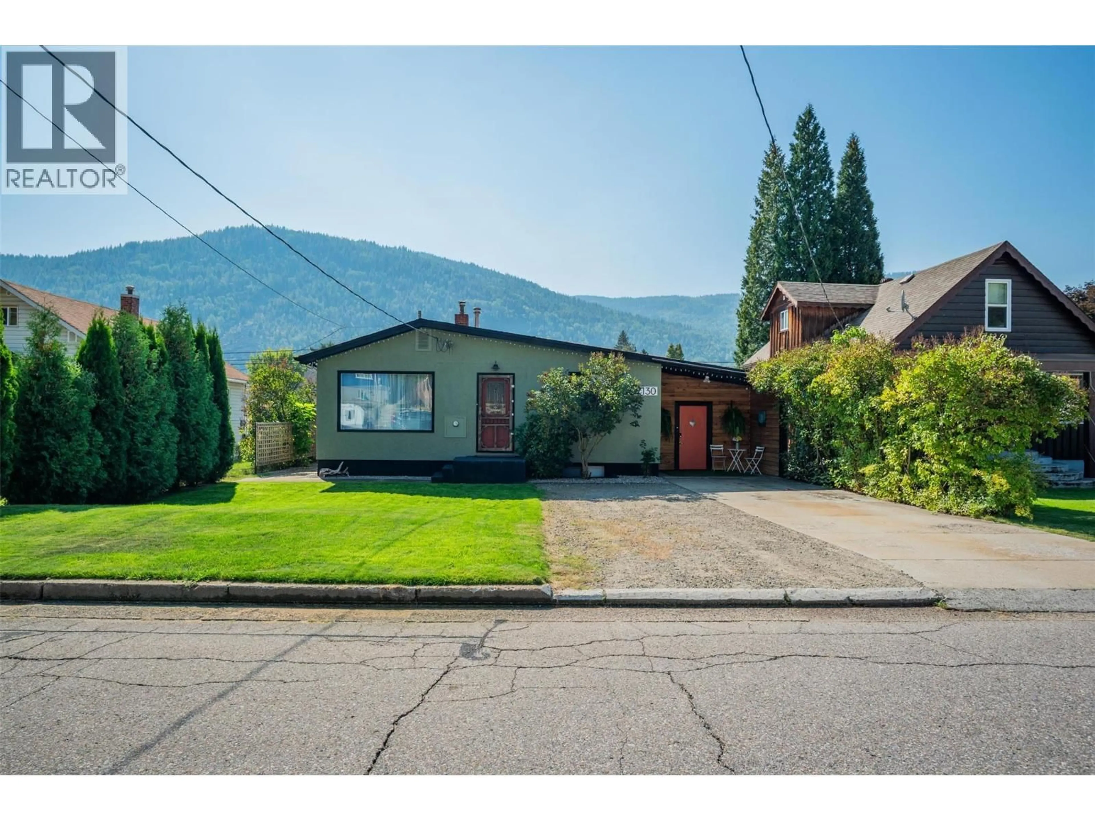 A pic from outside/outdoor area/front of a property/back of a property/a pic from drone, mountain view for 2130 SEVENTH AVENUE, Trail British Columbia V1R3C6