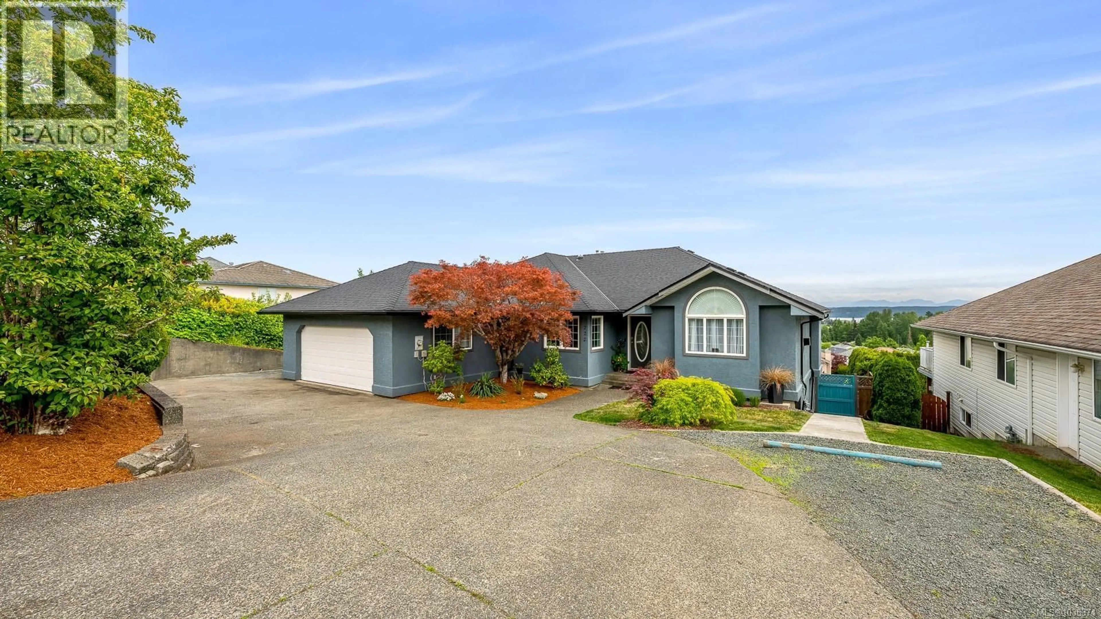 Home with vinyl exterior material, street for 722 NELSON ROAD, Campbell River British Columbia V9H1S1