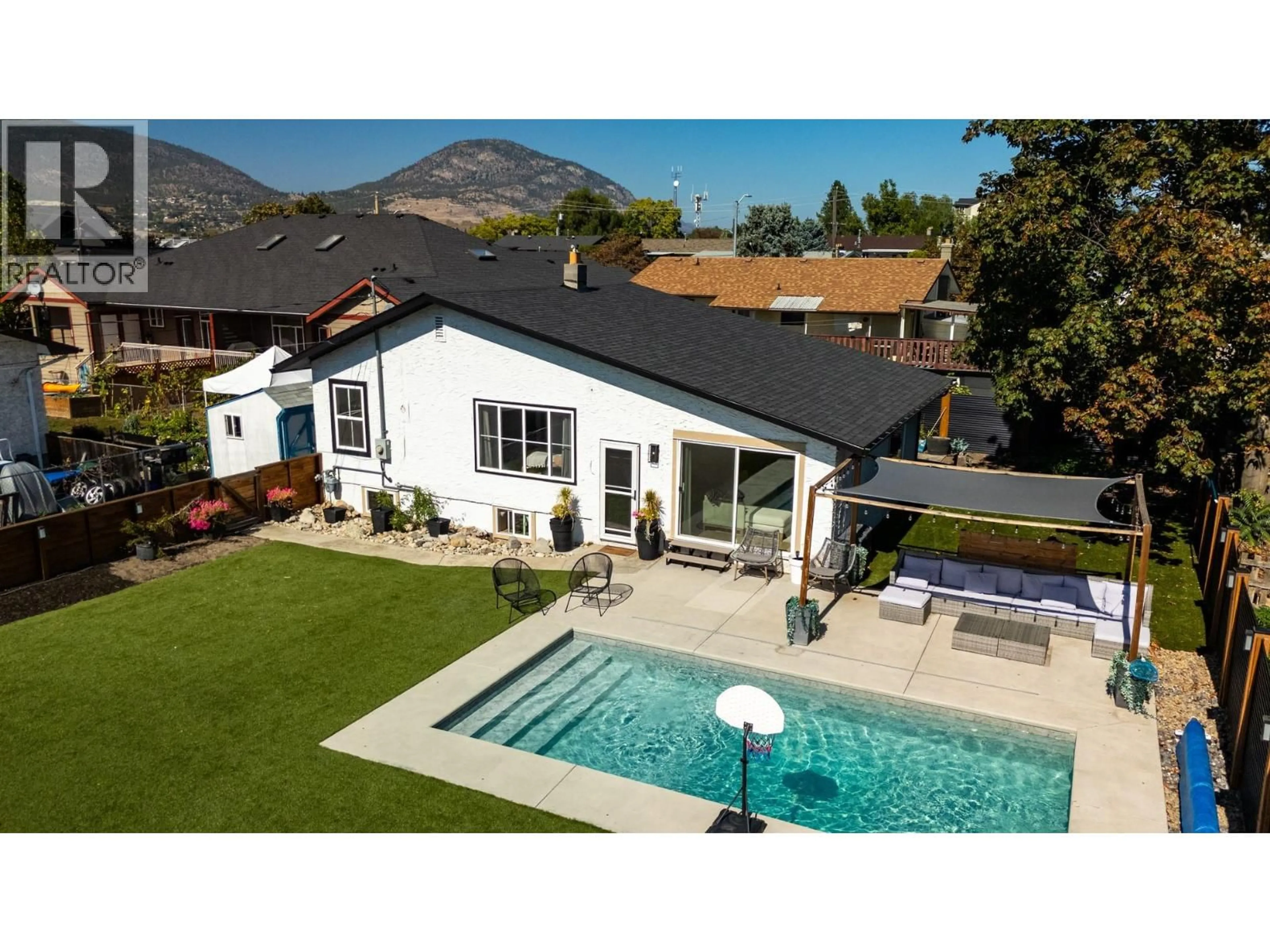 A pic from outside/outdoor area/front of a property/back of a property/a pic from drone, mountain view for 161 HUTH AVENUE, Penticton British Columbia V2A2Z7