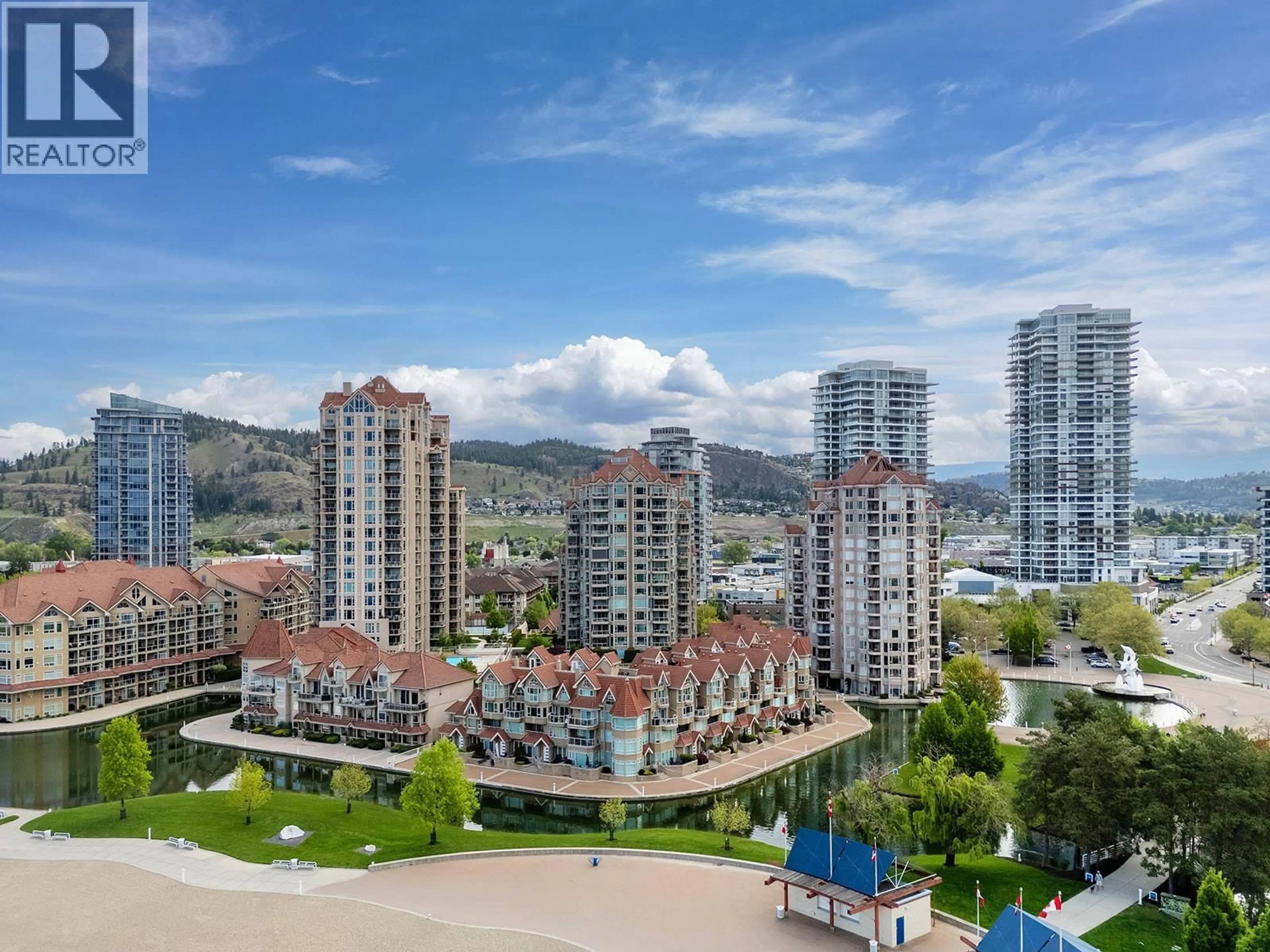 A pic from outside/outdoor area/front of a property/back of a property/a pic from drone, city buildings view from balcony for 903 - 1152 SUNSET DRIVE, Kelowna British Columbia V1Y9R7