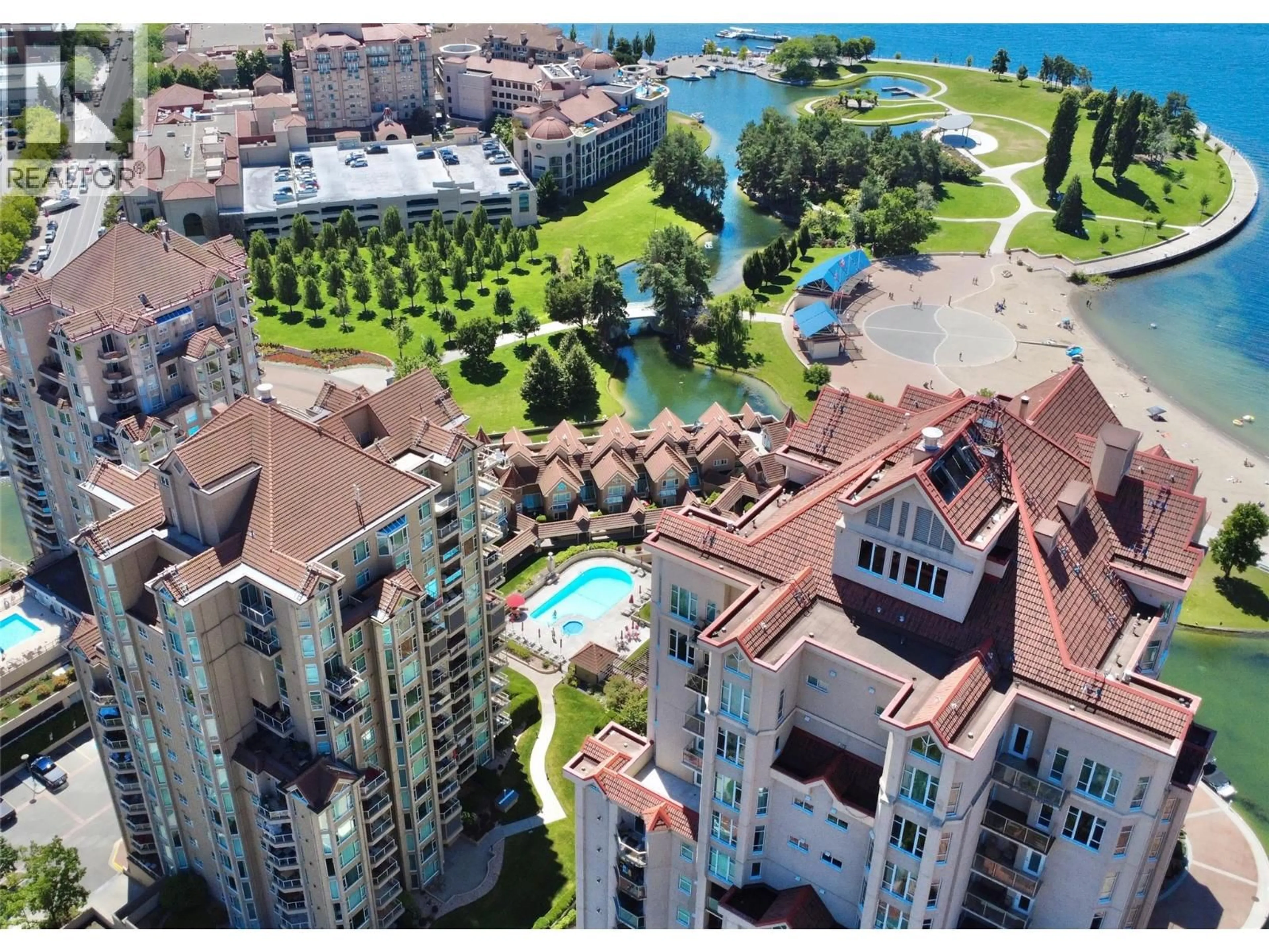 A pic from outside/outdoor area/front of a property/back of a property/a pic from drone, water/lake/river/ocean view for 903 - 1152 SUNSET DRIVE, Kelowna British Columbia V1Y9R7