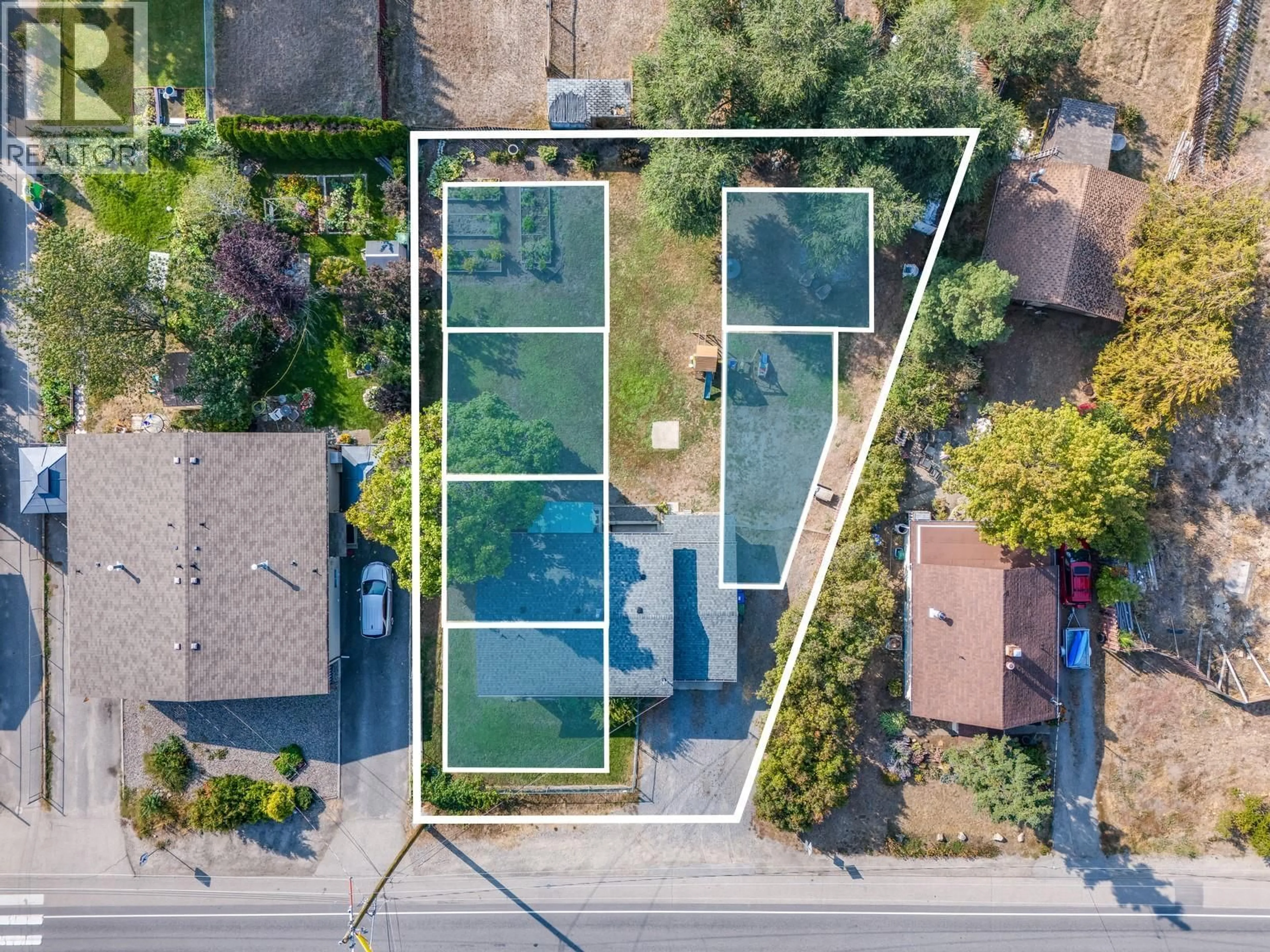 A pic from outside/outdoor area/front of a property/back of a property/a pic from drone, street for 470 GERSTMAR ROAD, Kelowna British Columbia V1X4B1
