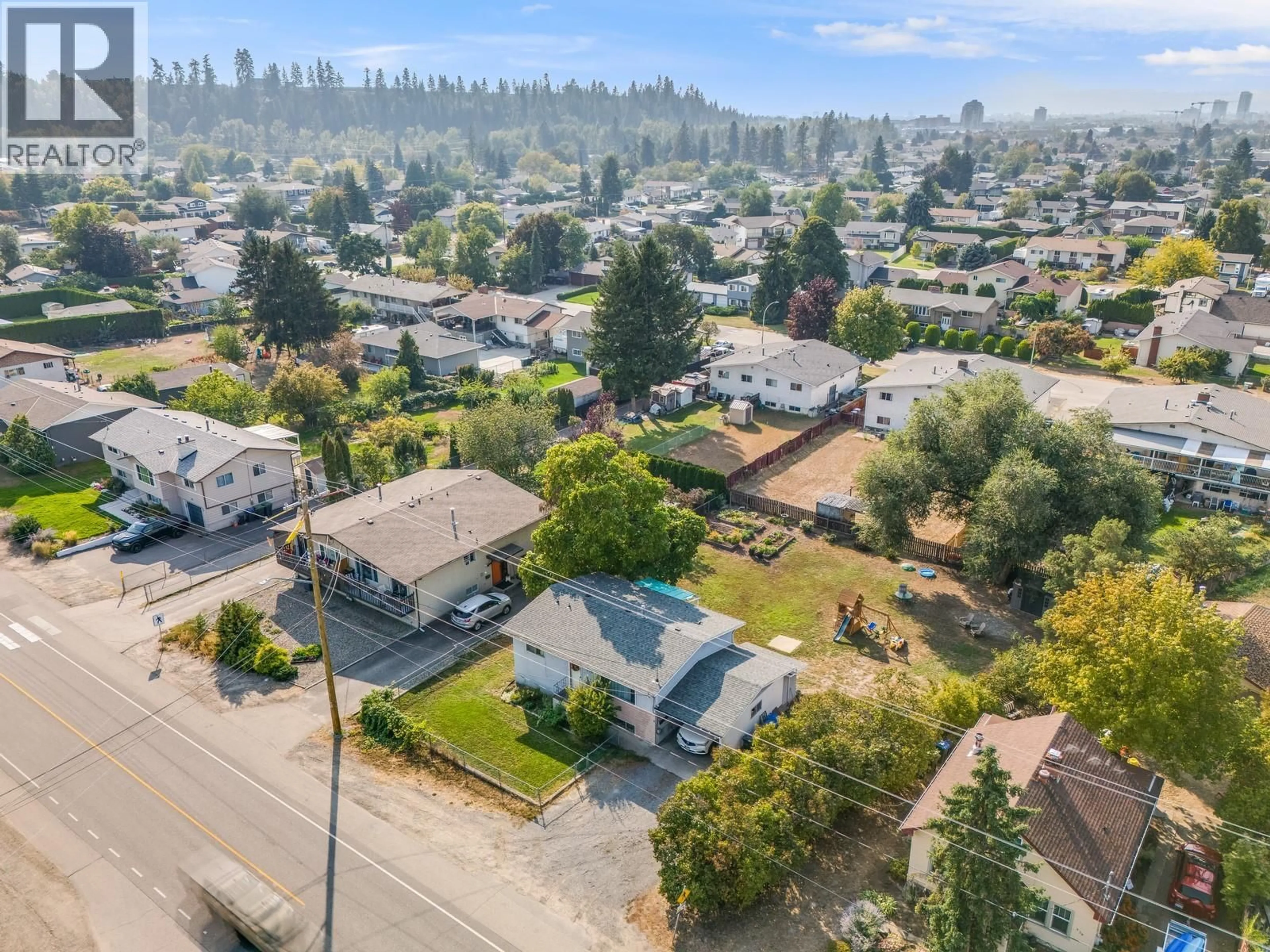 A pic from outside/outdoor area/front of a property/back of a property/a pic from drone, street for 470 GERSTMAR ROAD, Kelowna British Columbia V1X4B1