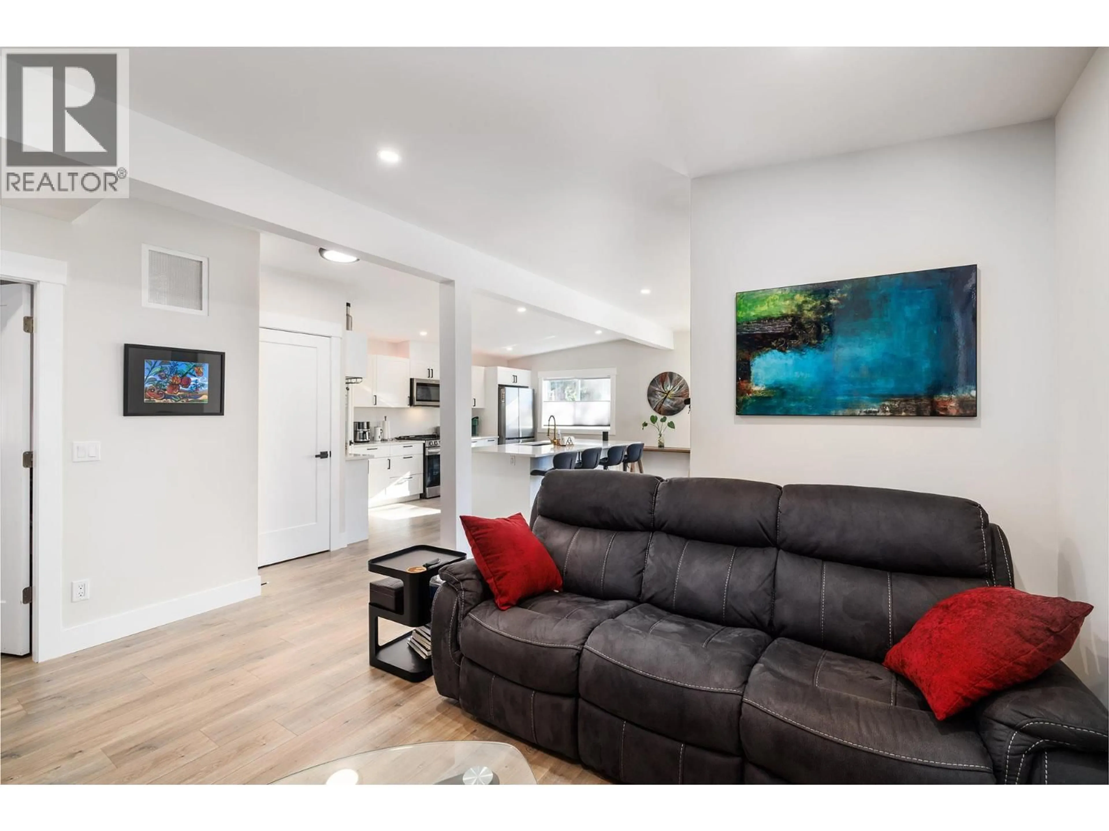Living room with furniture, wood/laminate floor for 214 - 1999 HWY 97 SOUTH OTHER, West Kelowna British Columbia V1Z1B2