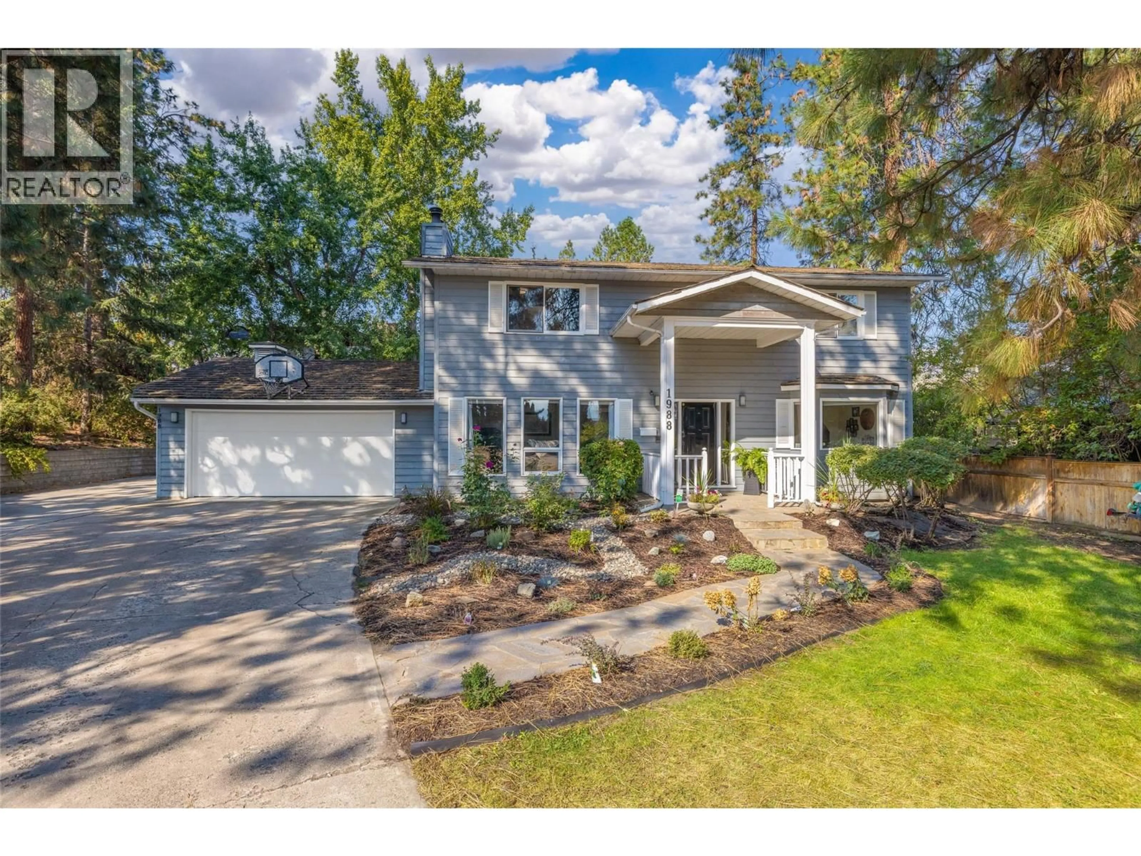 Home with vinyl exterior material, street for 1988 ABEL STREET, West Kelowna British Columbia V1Z3C9