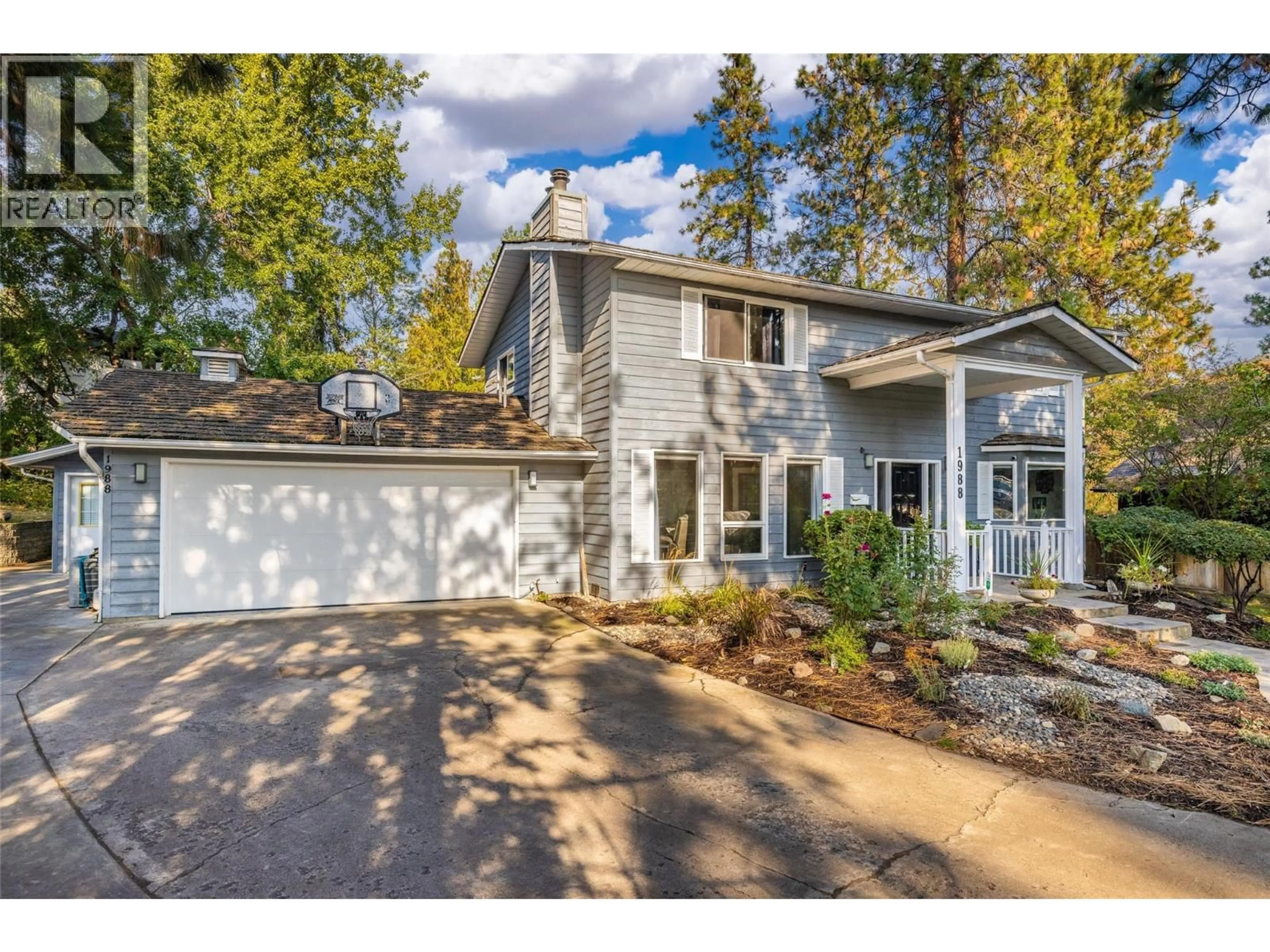 Home with vinyl exterior material, street for 1988 ABEL STREET, West Kelowna British Columbia V1Z3C9