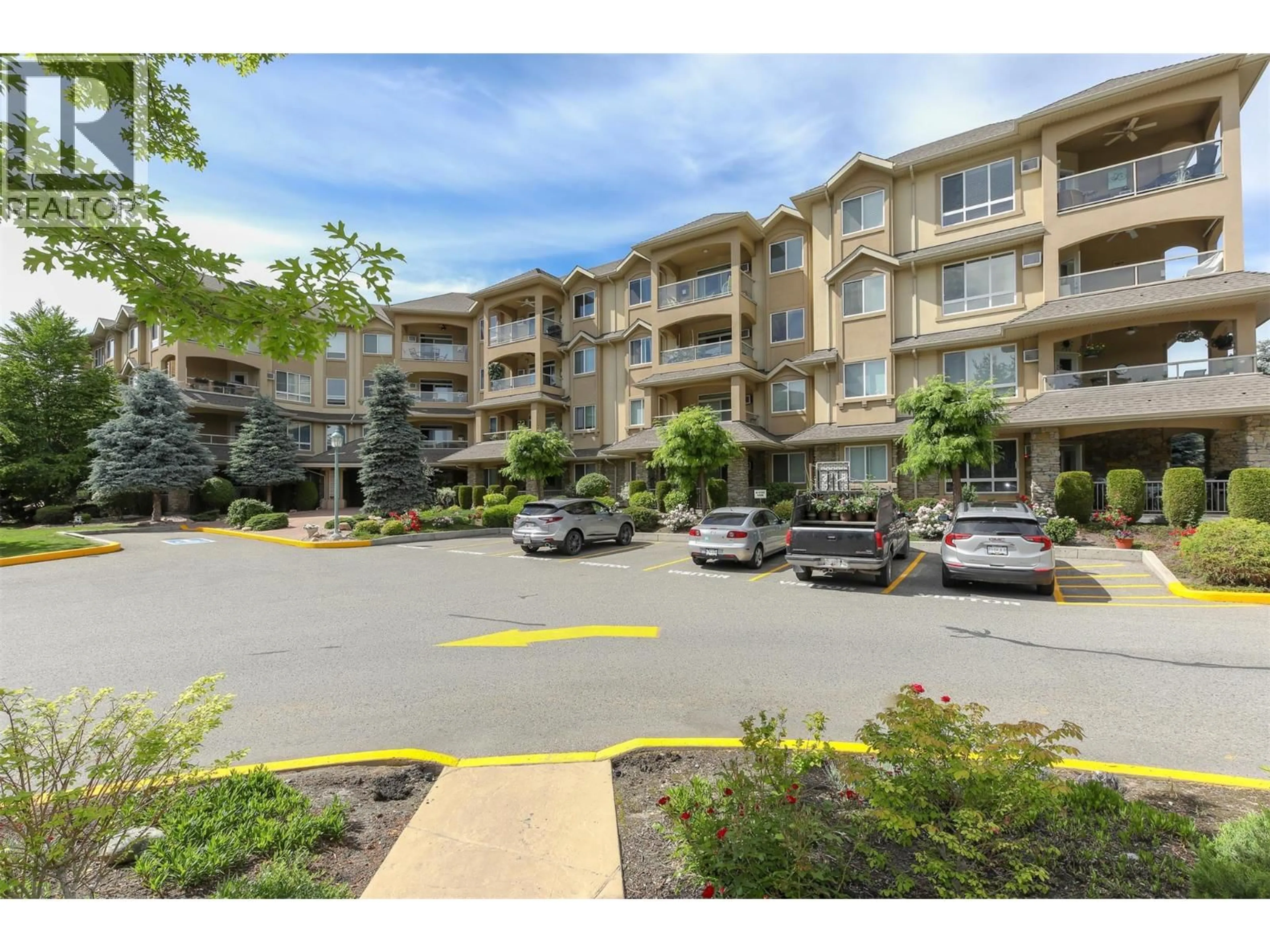 Patio, mountain view for 411 - 1962 ENTERPRISE WAY, Kelowna British Columbia V1Y9S6