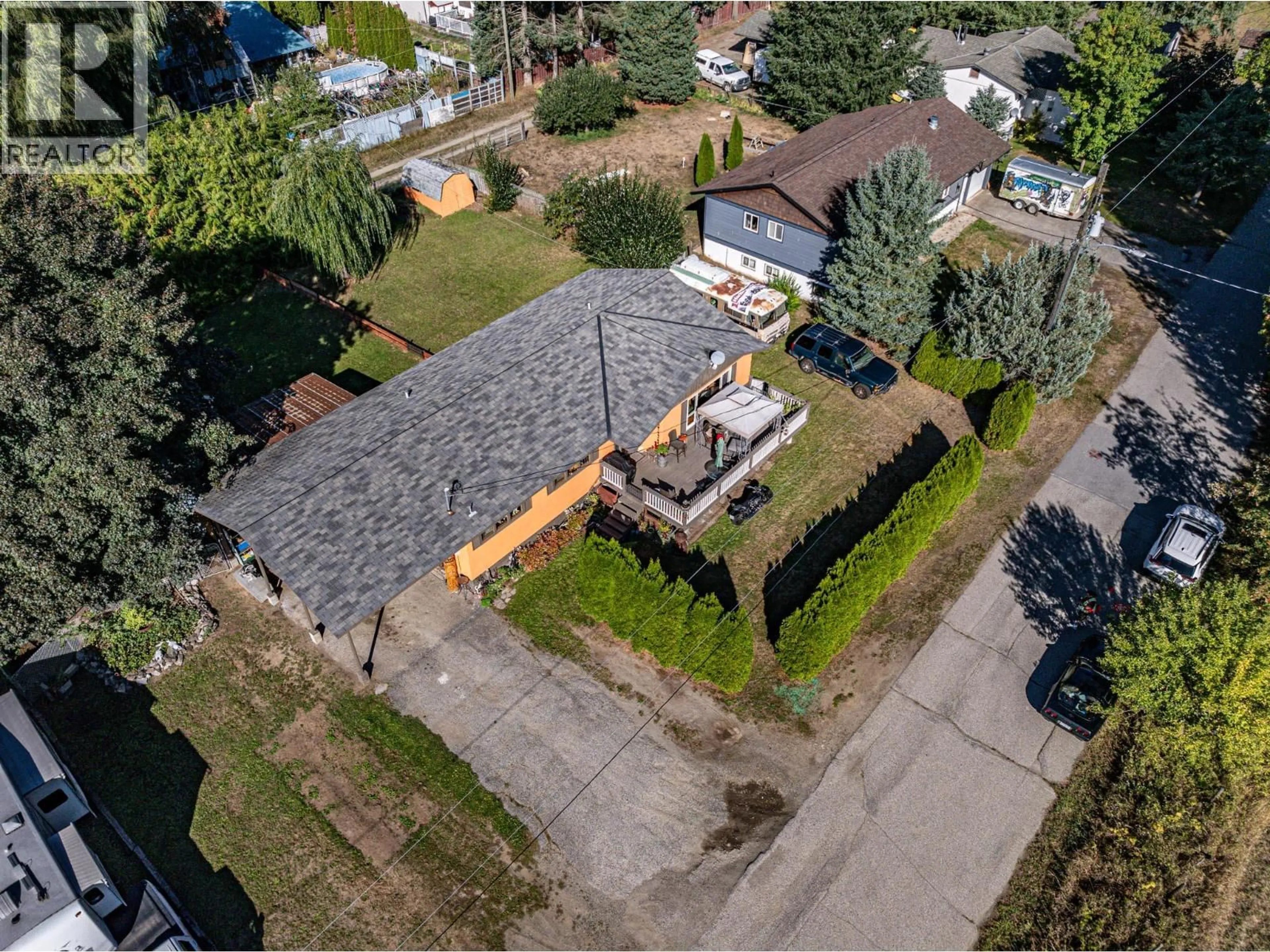 A pic from outside/outdoor area/front of a property/back of a property/a pic from drone, street for 804 CEDAR AVENUE, Salmo British Columbia V0G1Z0