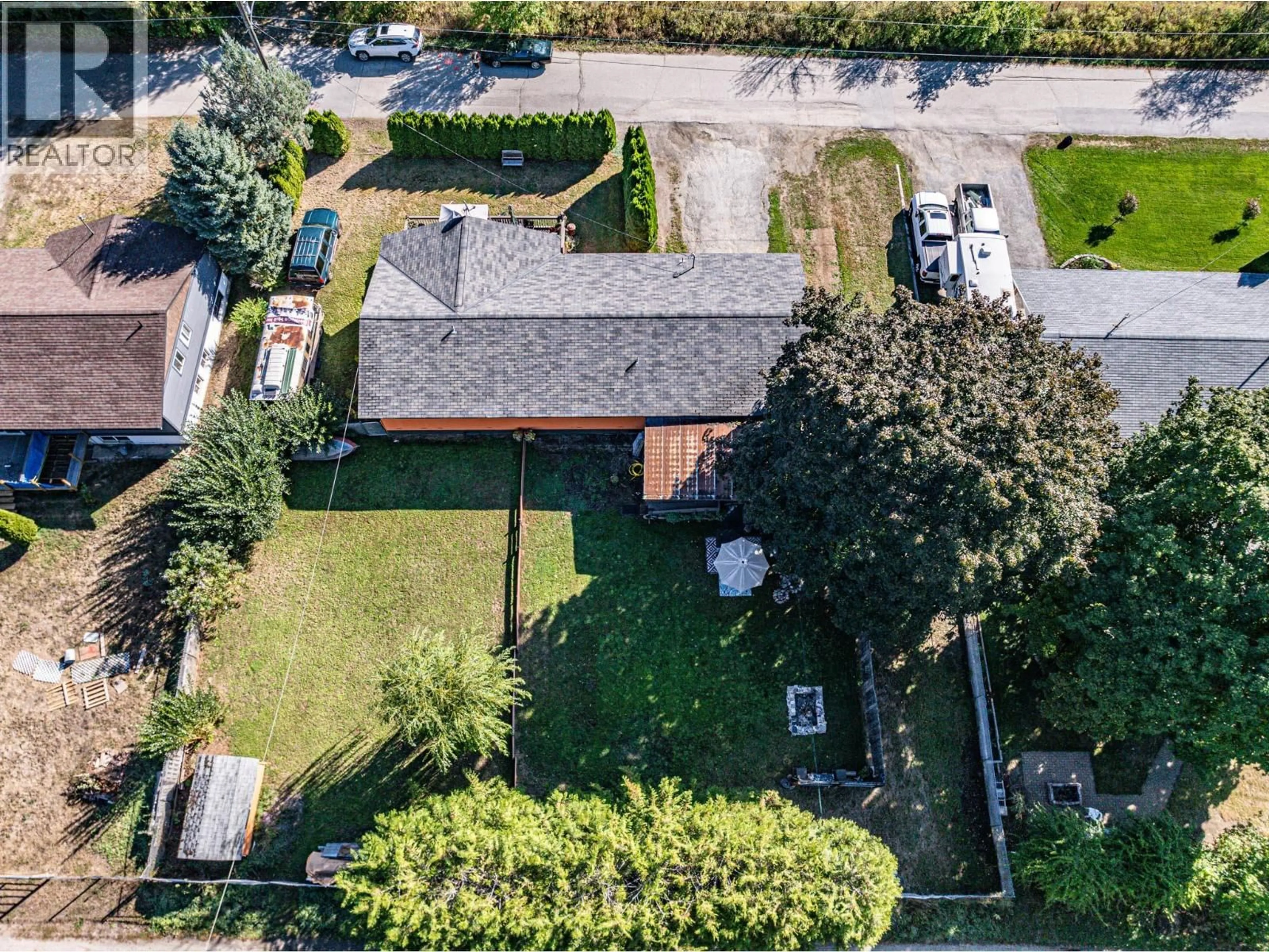 A pic from outside/outdoor area/front of a property/back of a property/a pic from drone, street for 804 CEDAR AVENUE, Salmo British Columbia V0G1Z0
