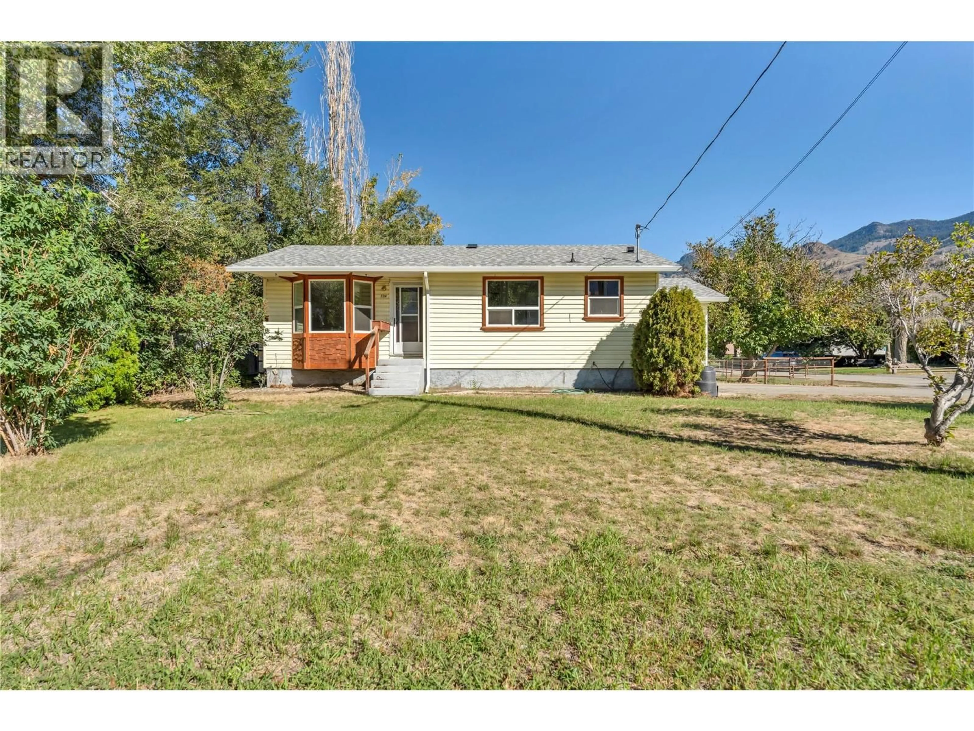 A pic from outside/outdoor area/front of a property/back of a property/a pic from drone, street for 714 2ND AVENUE, Keremeos British Columbia V0X1N2