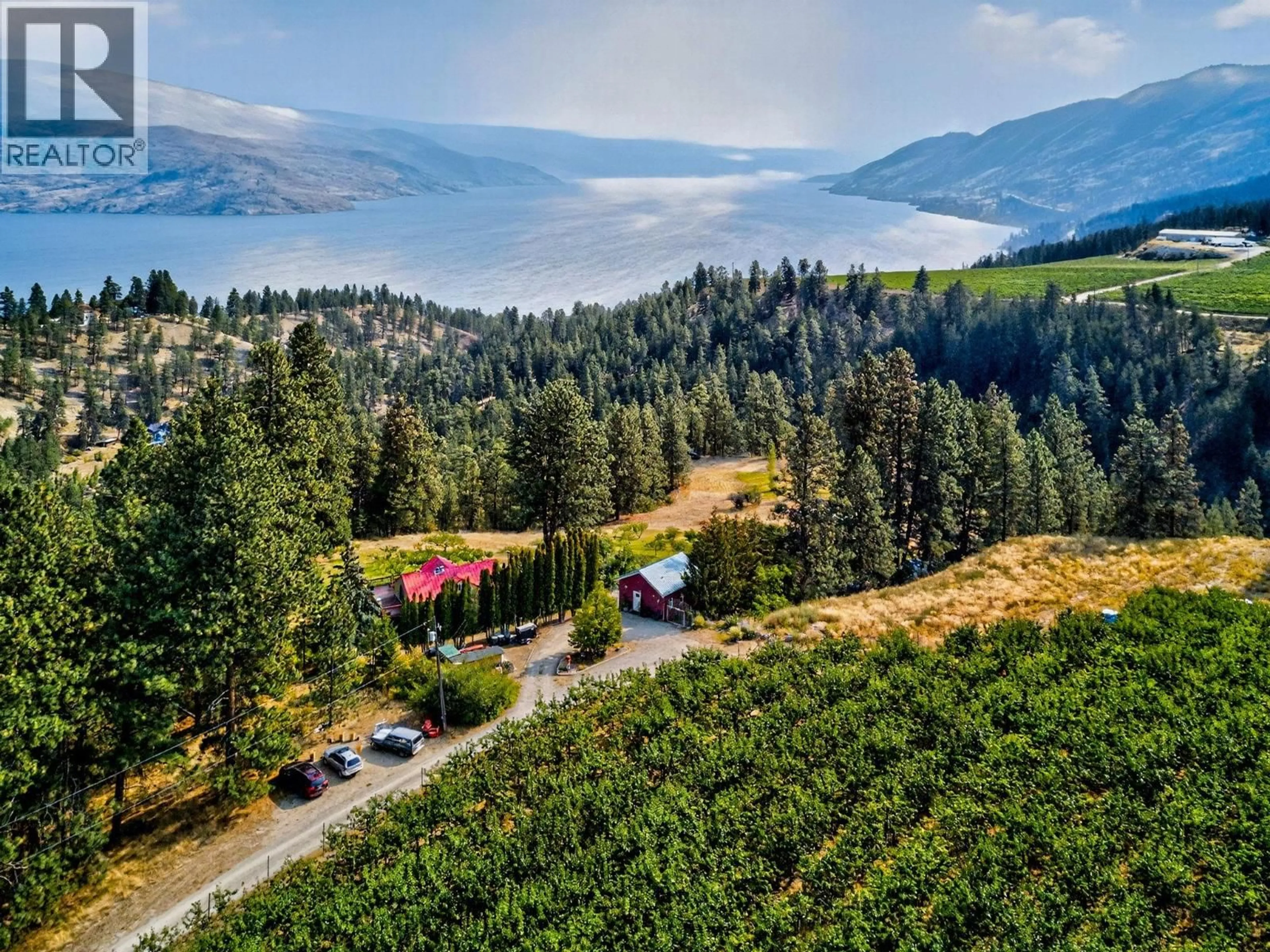 A pic from outside/outdoor area/front of a property/back of a property/a pic from drone, unknown for 5010 ELLIOTT AVENUE, Peachland British Columbia V0H1X8
