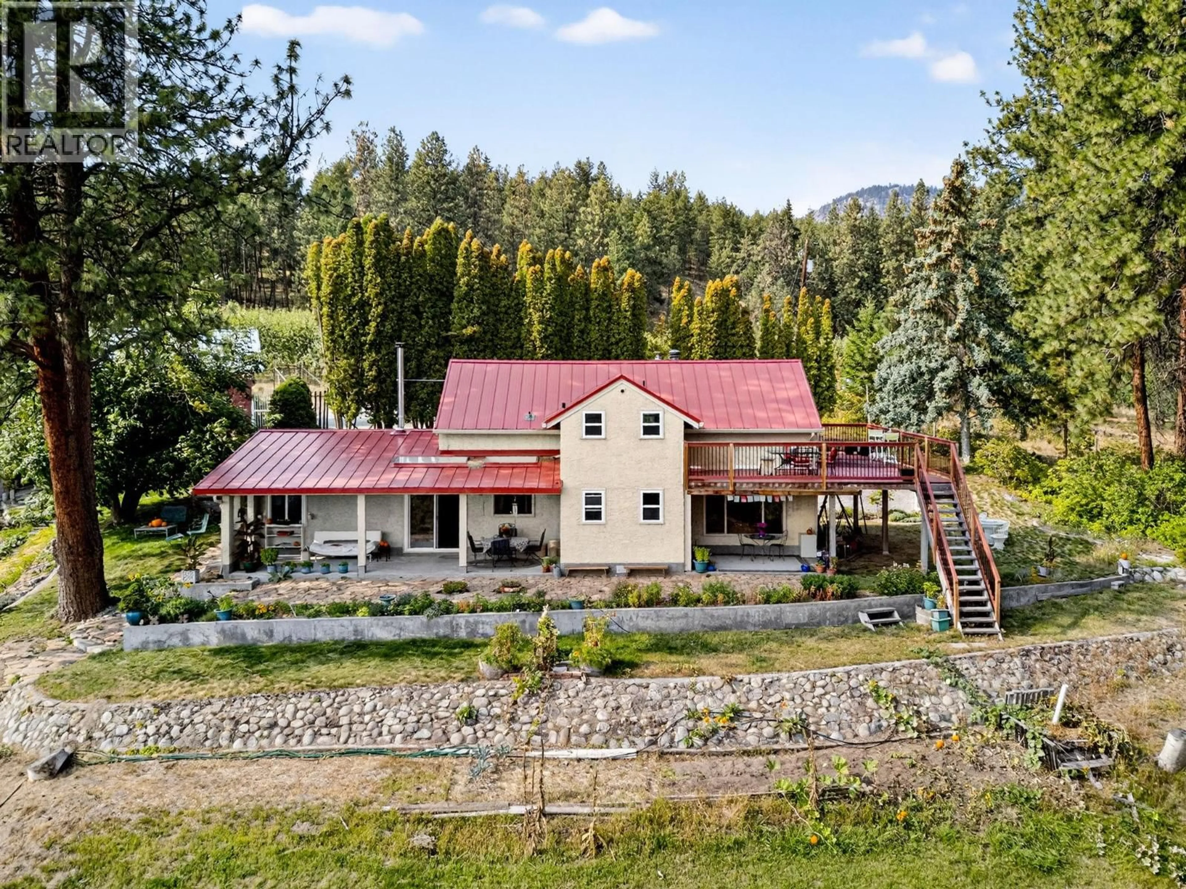 A pic from outside/outdoor area/front of a property/back of a property/a pic from drone, mountain view for 5010 ELLIOTT AVENUE, Peachland British Columbia V0H1X8