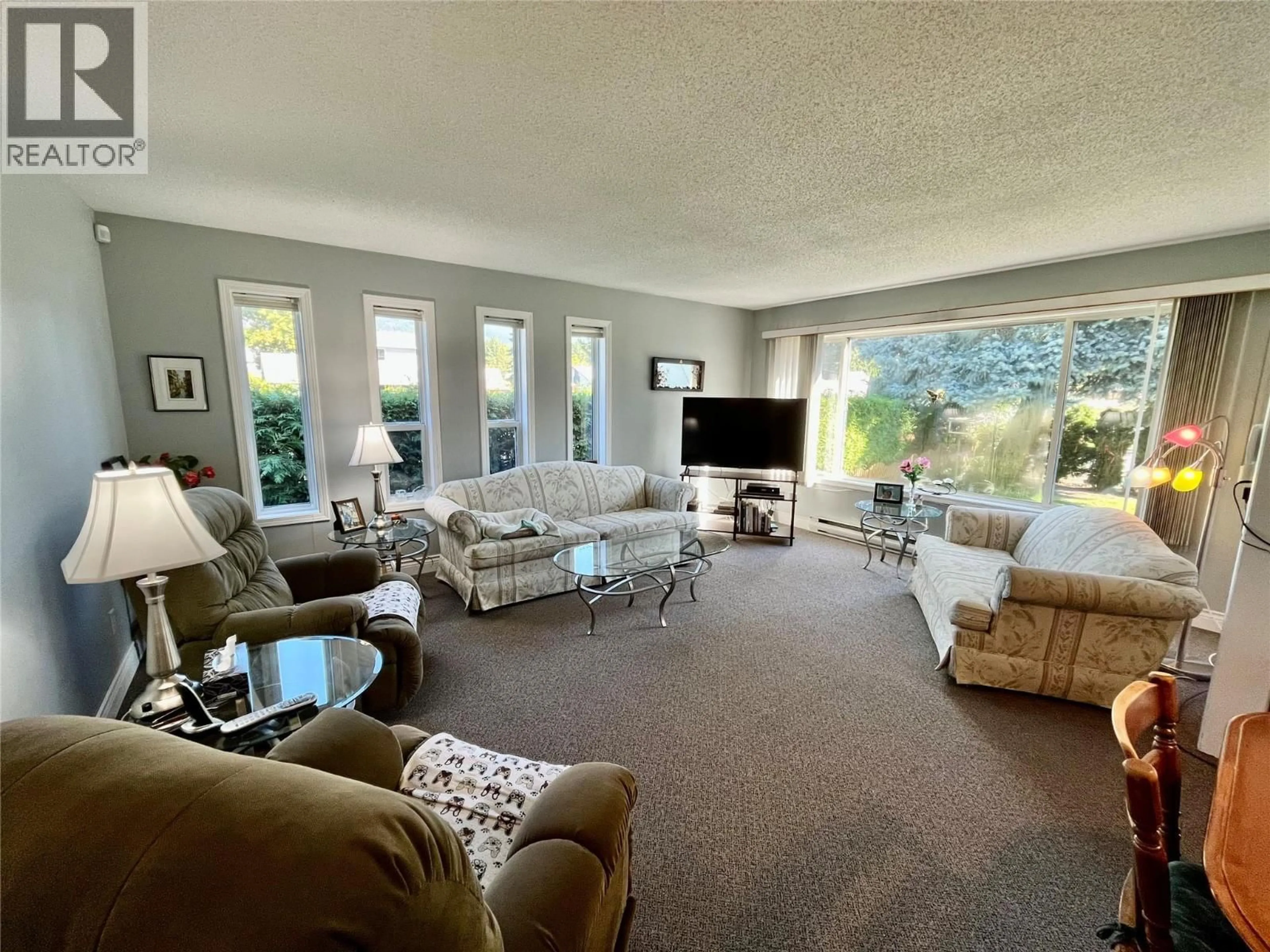 Living room with furniture, unknown for 120 4TH AVENUE NORTHWEST, Nakusp British Columbia V0G1R0