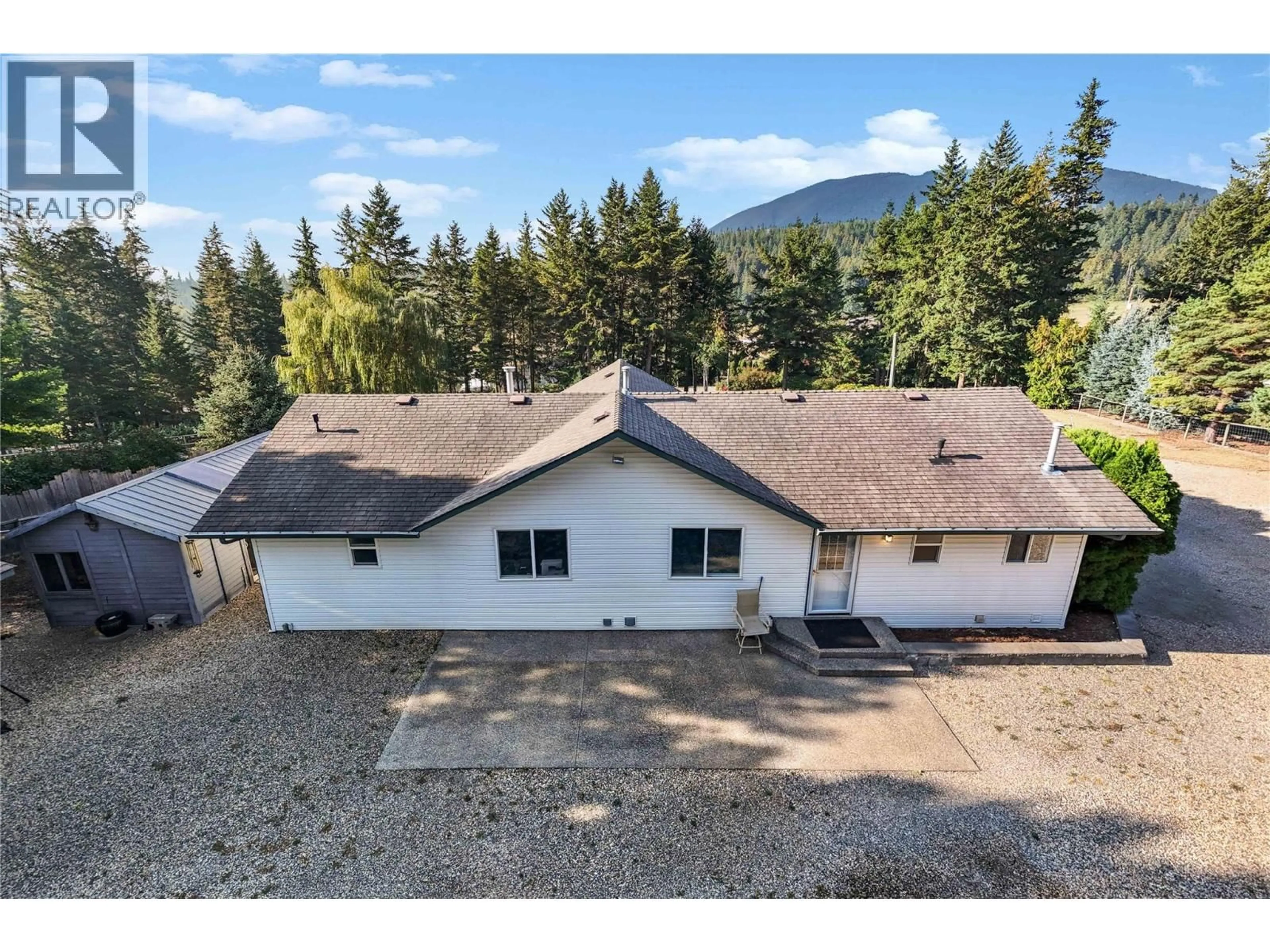 A pic from outside/outdoor area/front of a property/back of a property/a pic from drone, mountain view for 760 MOBLEY ROAD, Tappen British Columbia V0E2X1