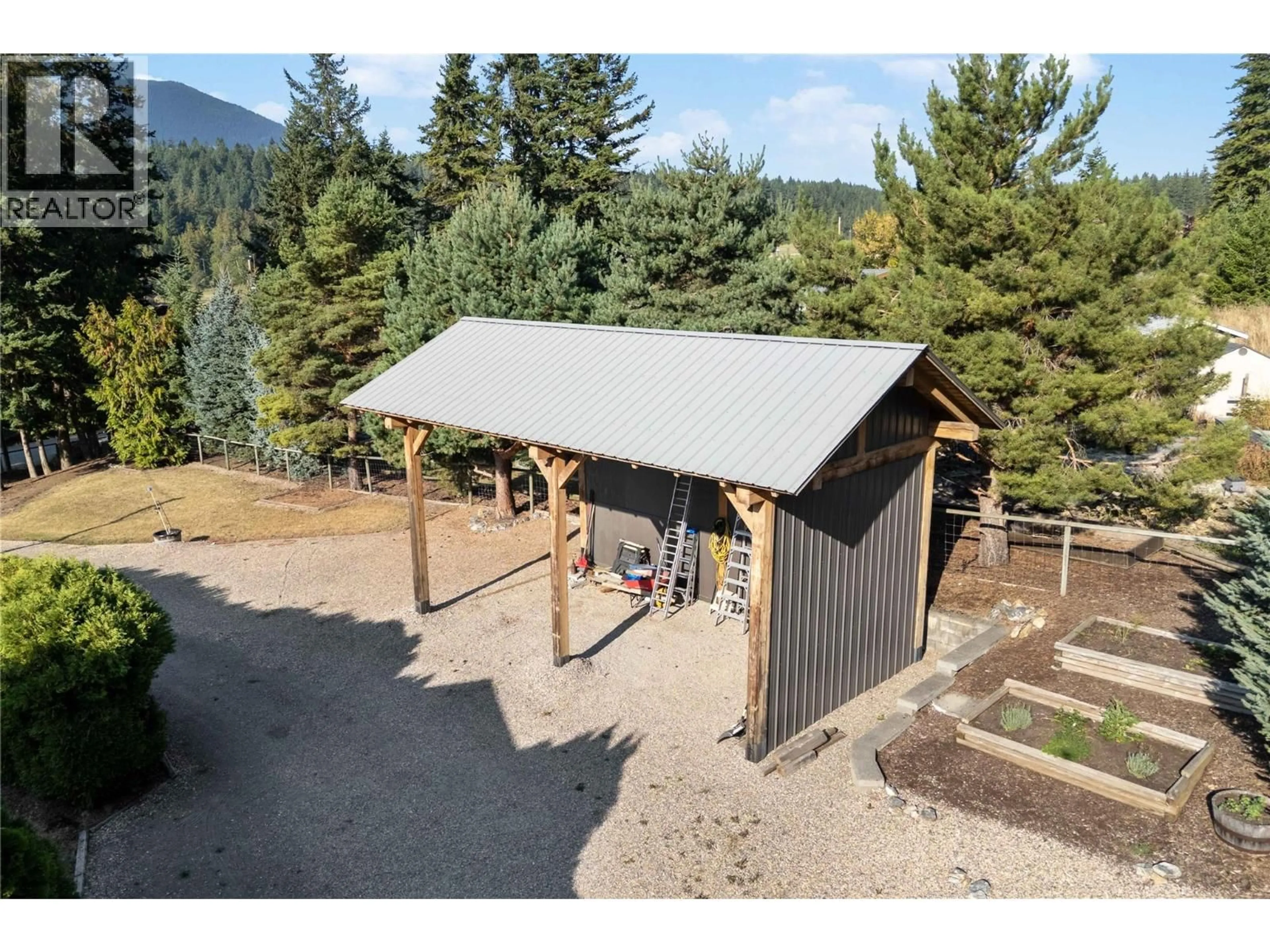 A pic from outside/outdoor area/front of a property/back of a property/a pic from drone, mountain view for 760 MOBLEY ROAD, Tappen British Columbia V0E2X1