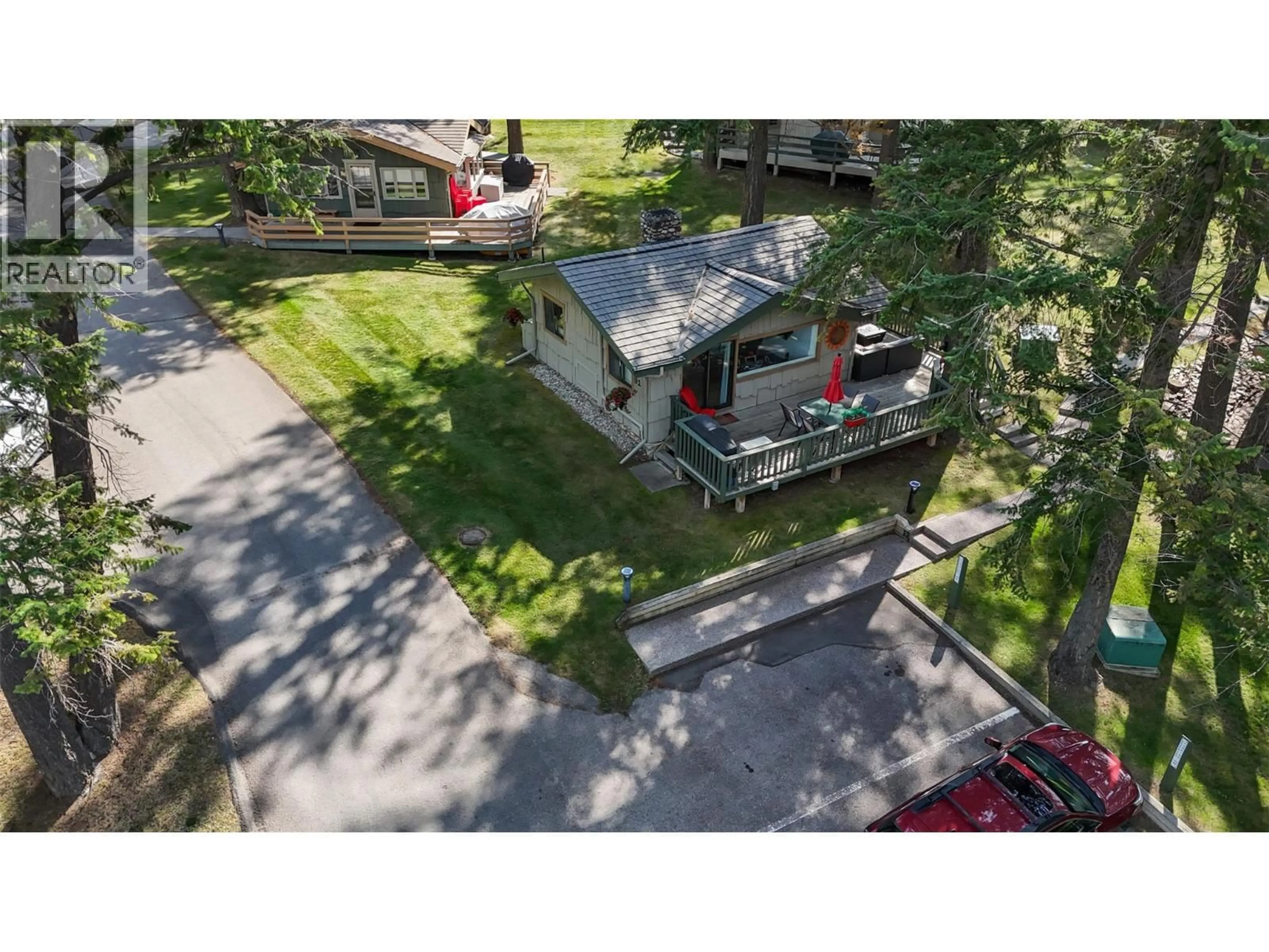 A pic from outside/outdoor area/front of a property/back of a property/a pic from drone, street for 91 - 1492 AKISKINOOK ROAD, Windermere British Columbia V0B2L1